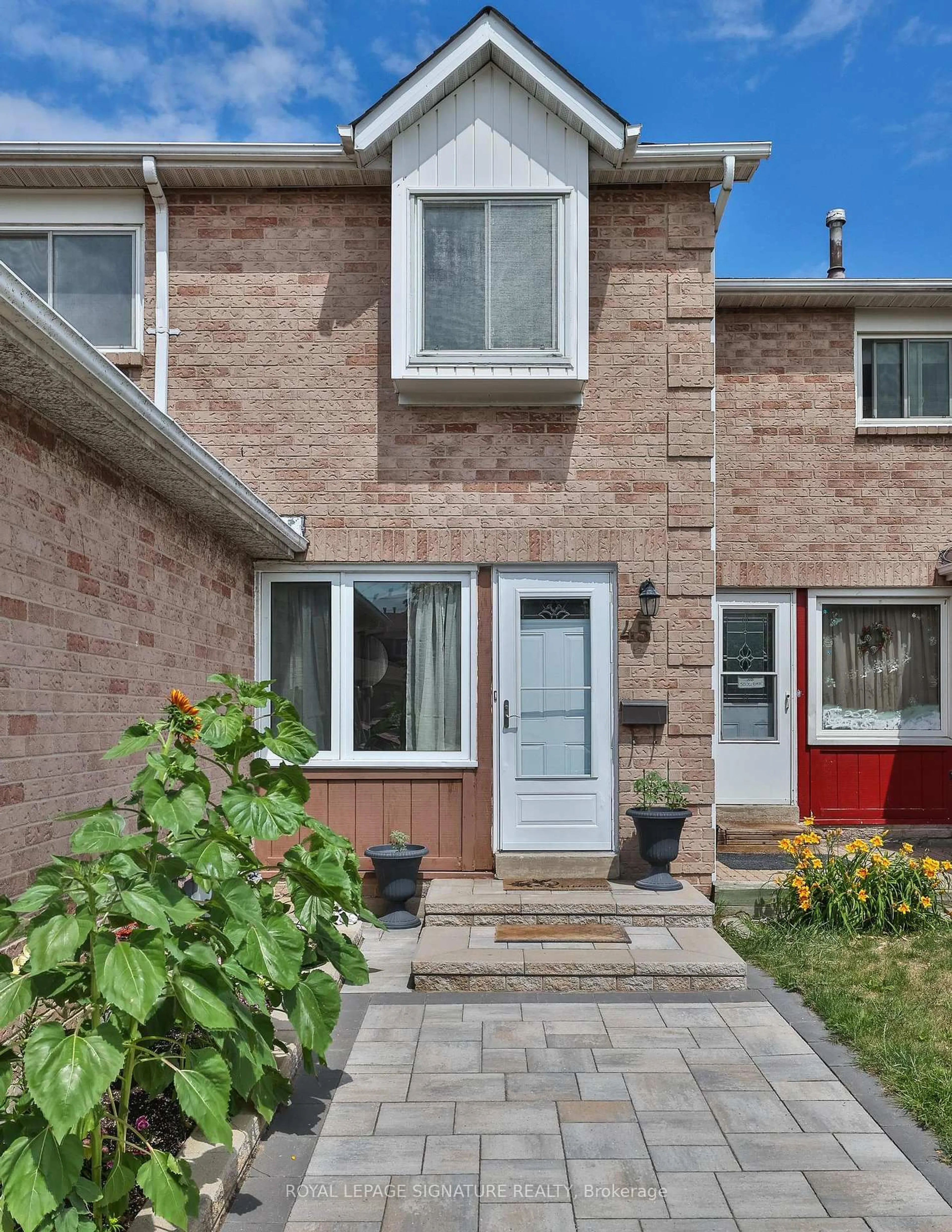 Home with brick exterior material, street for 45 Tams Dr, Ajax Ontario L1Z 1A3