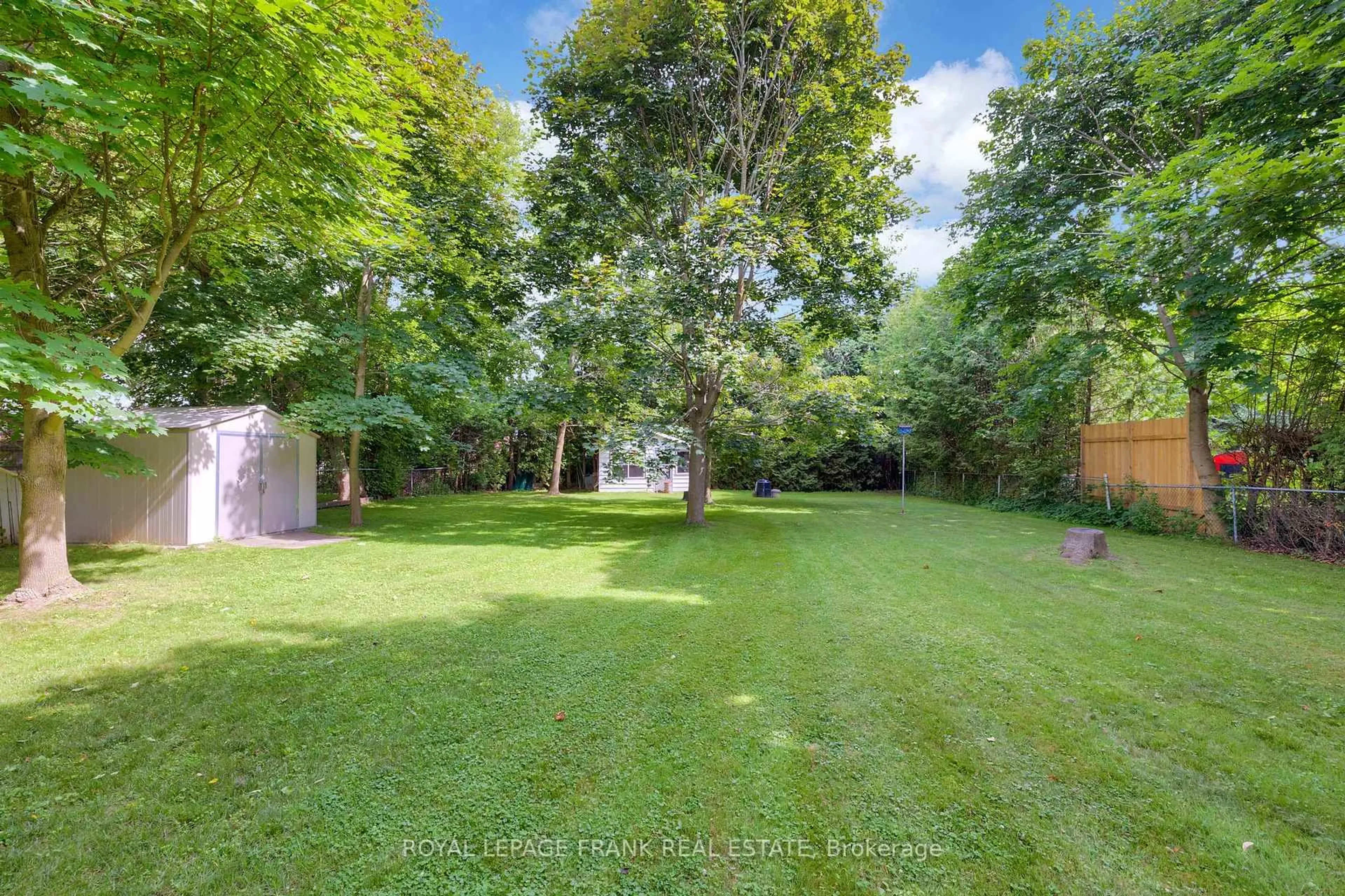 A pic from outside/outdoor area/front of a property/back of a property/a pic from drone, forest/trees view for 17 Phair Ave, Clarington Ontario L1E 2W5