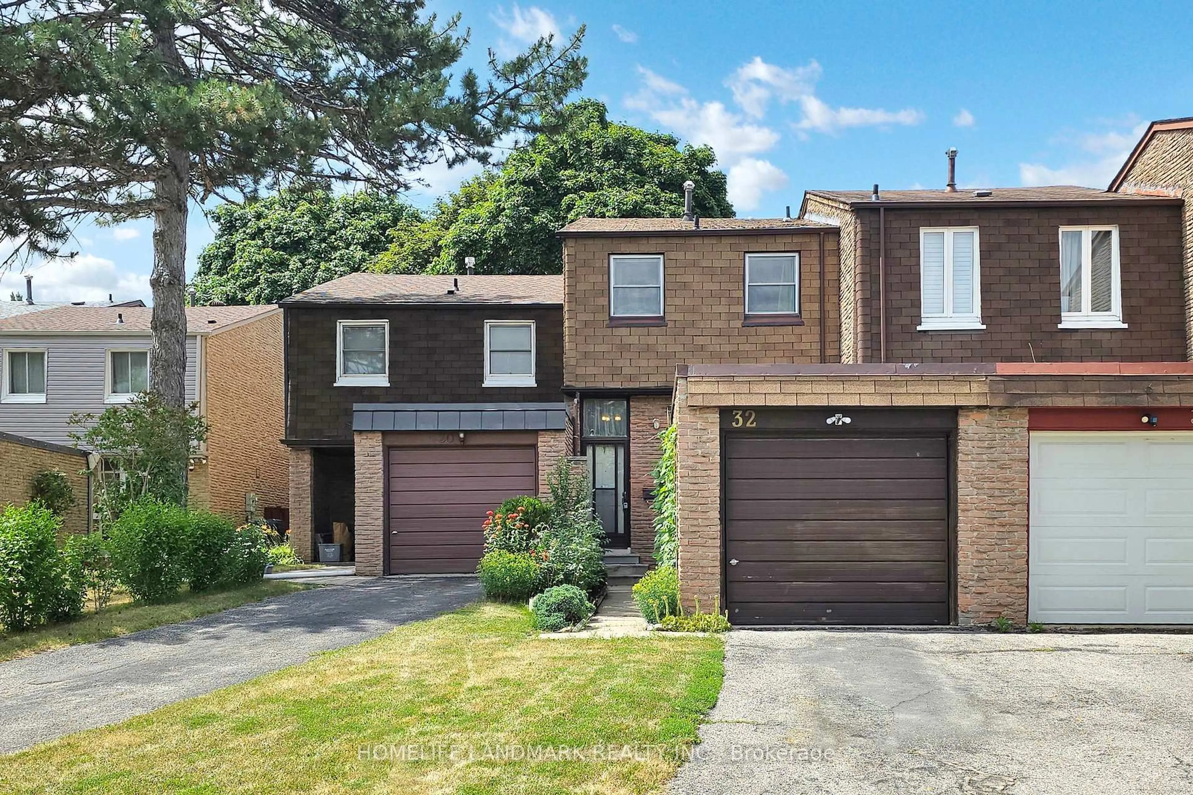 Home with brick exterior material, street for 32 L'amoreaux Dr, Toronto Ontario M1W 2L9