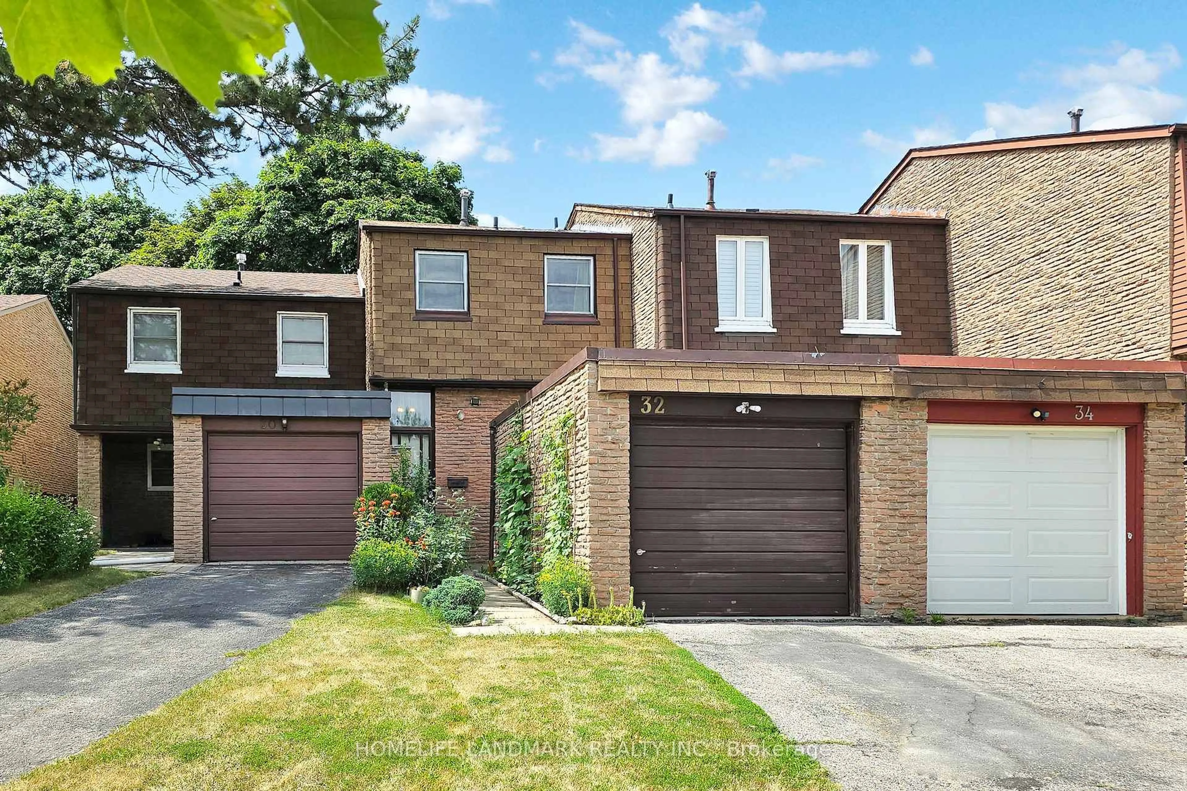 Home with brick exterior material, street for 32 L'amoreaux Dr, Toronto Ontario M1W 2L9
