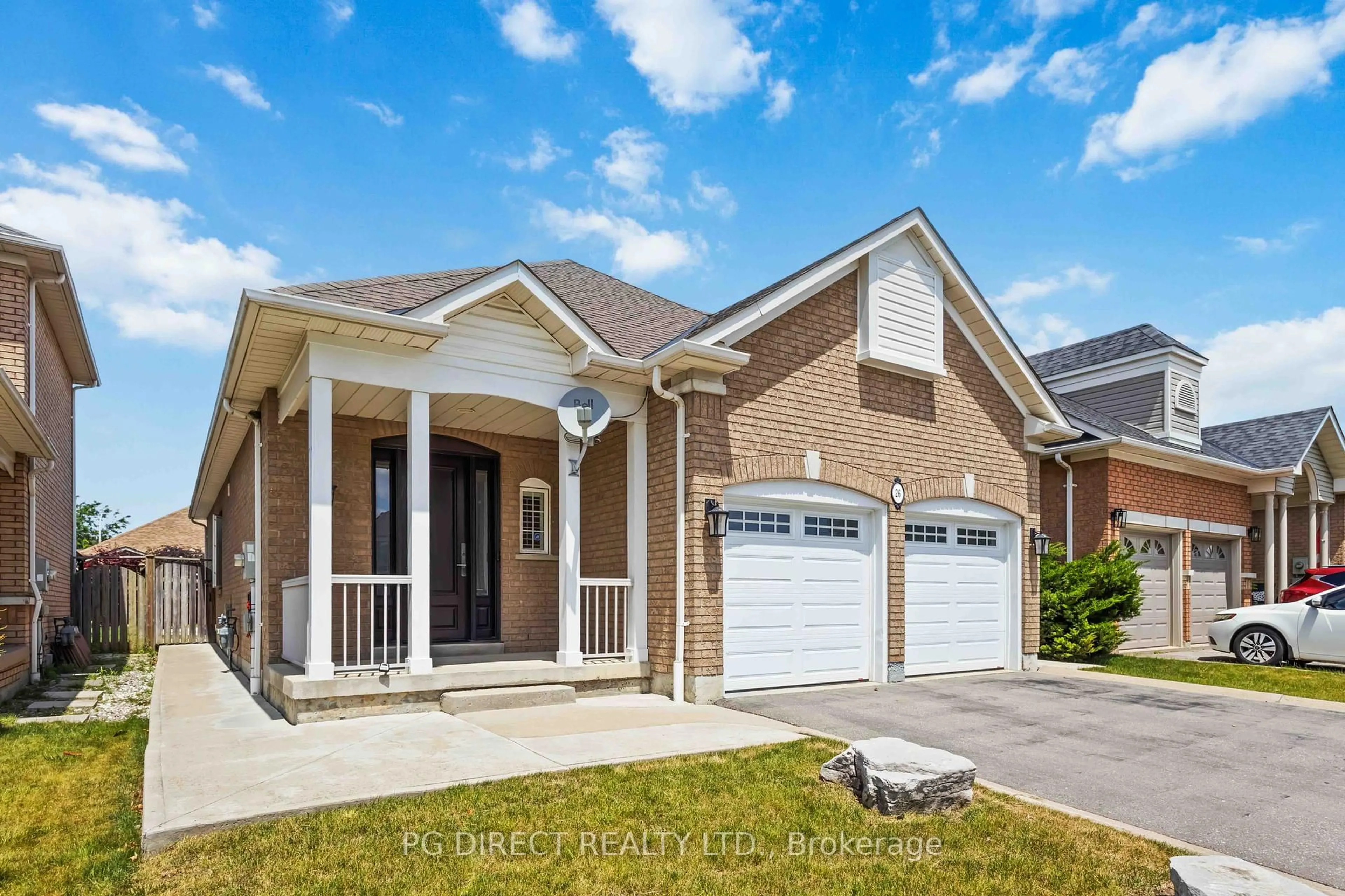 Home with brick exterior material, street for 26 Disney Crt, Whitby Ontario L1R 2X7