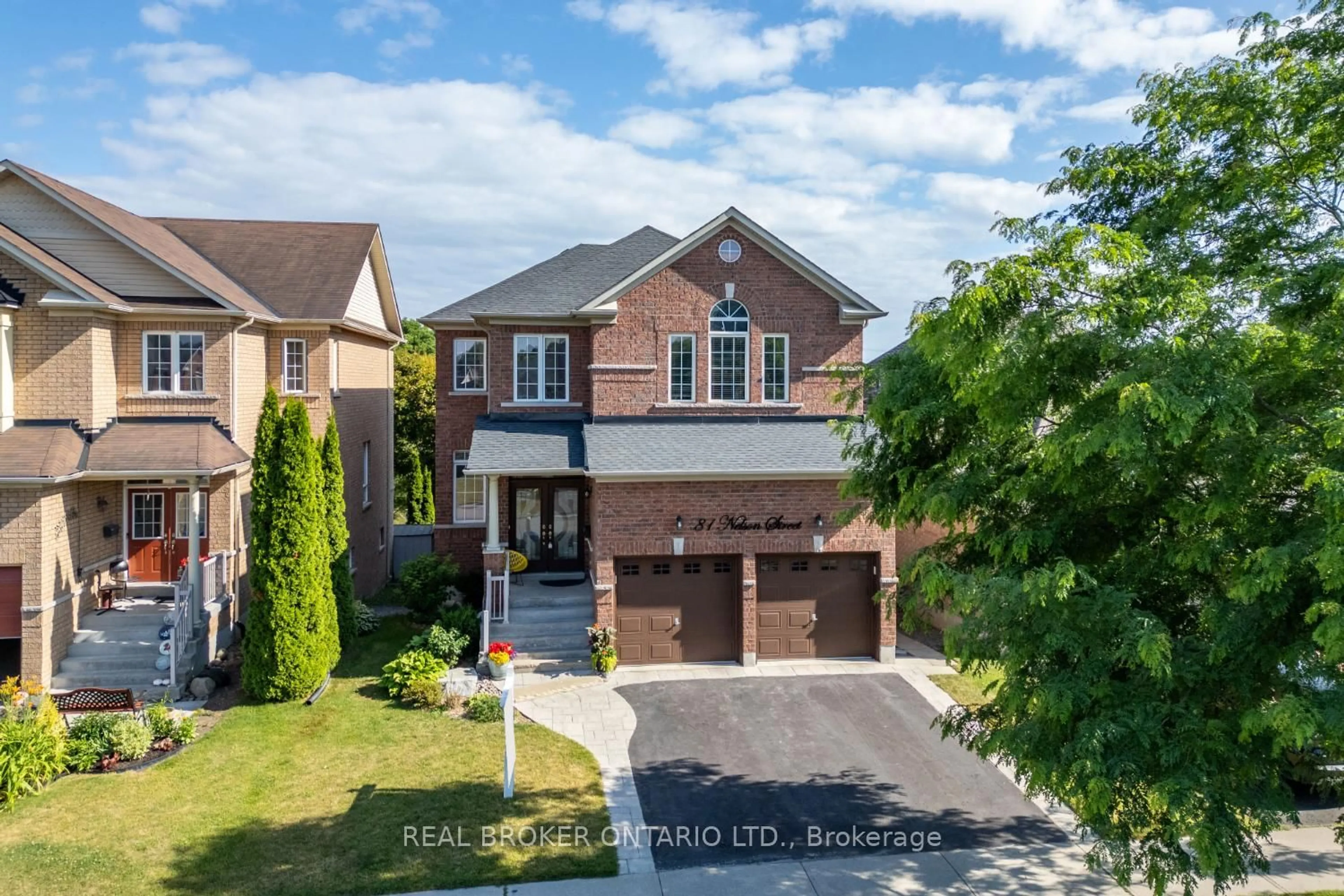 A pic from outside/outdoor area/front of a property/back of a property/a pic from drone, street for 81 Nelson St, Clarington Ontario L1C 0A7
