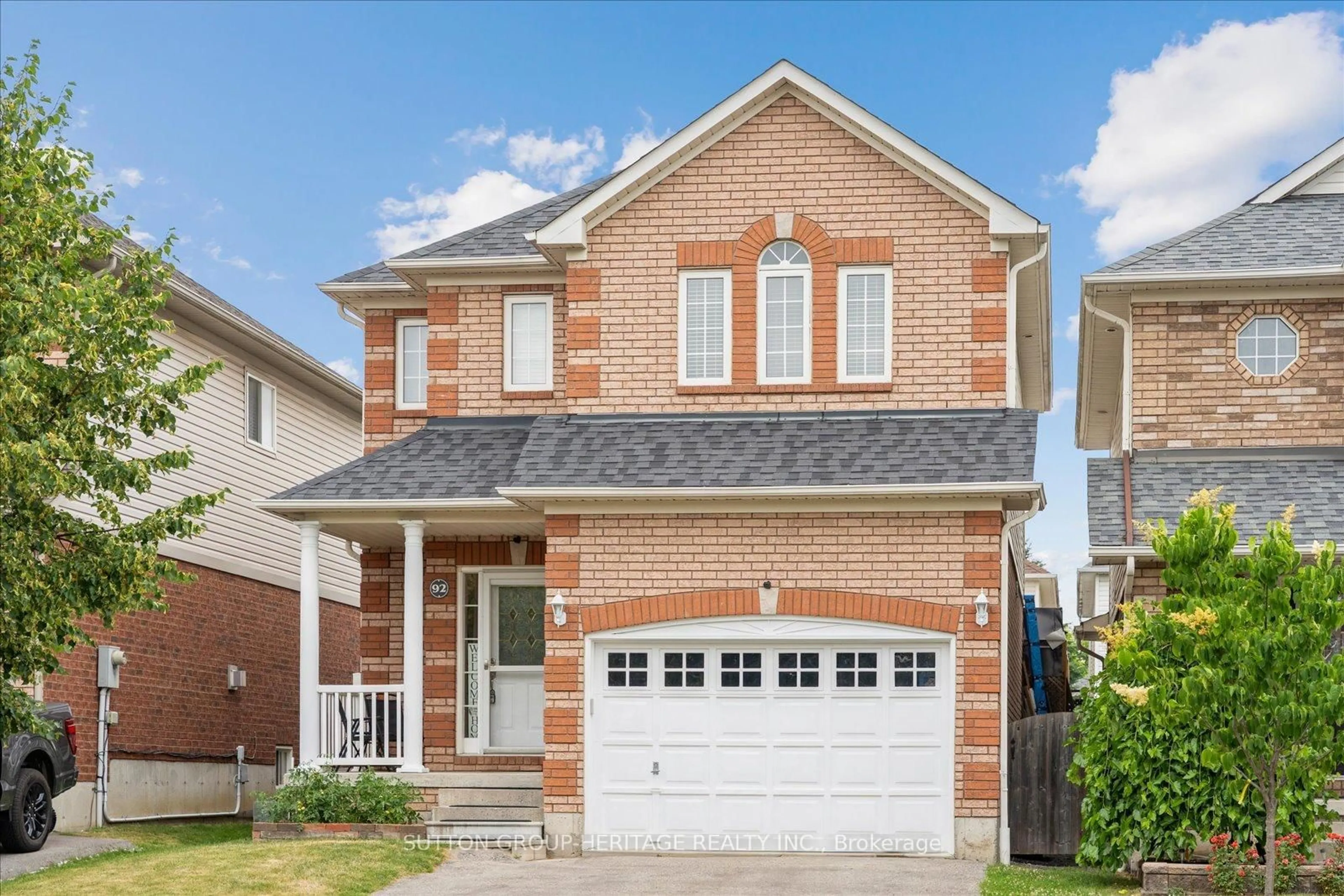 Home with brick exterior material, street for 92 Trudeau Dr, Clarington Ontario L1C 5K5