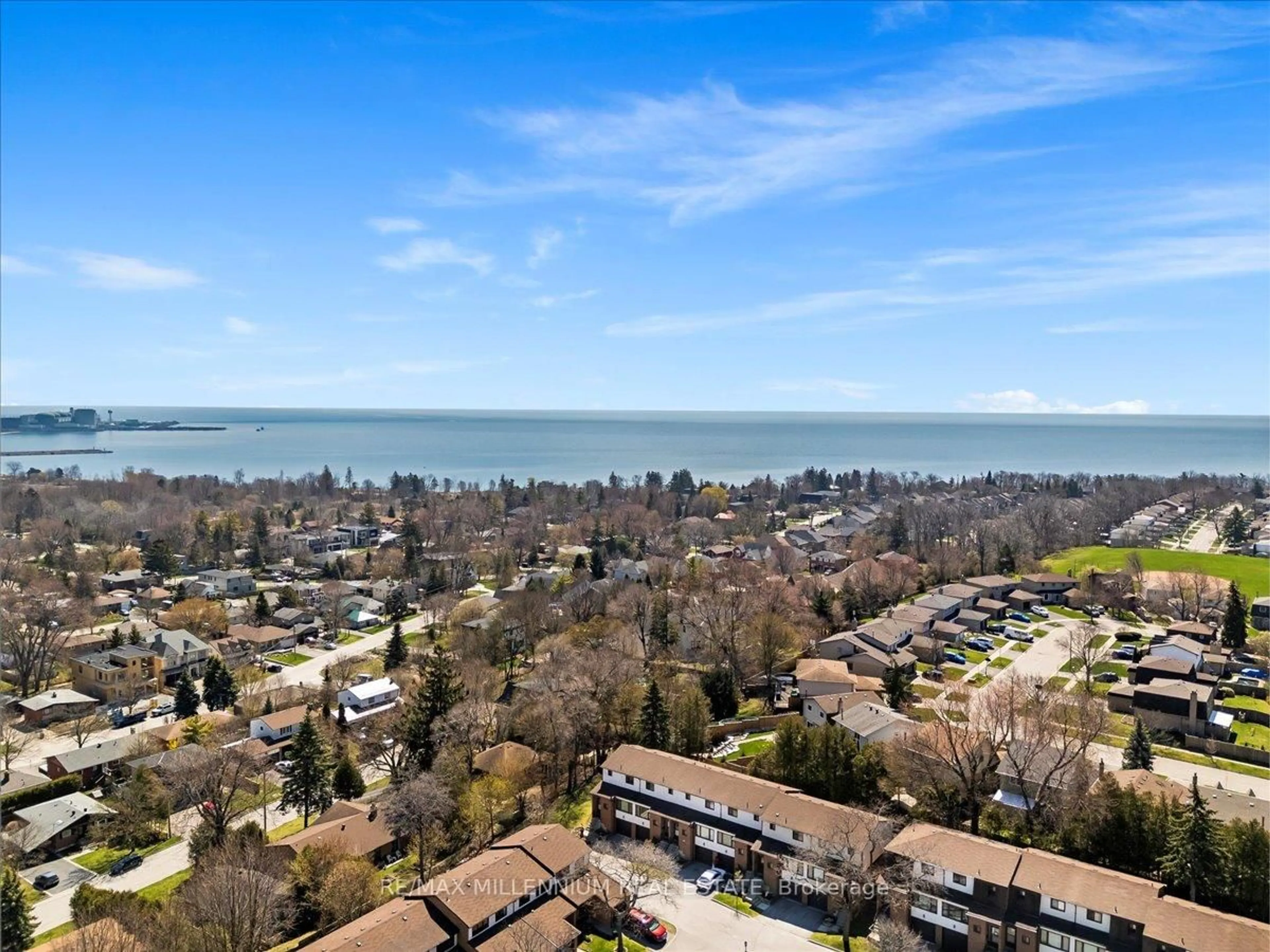 A pic from outside/outdoor area/front of a property/back of a property/a pic from drone, water/lake/river/ocean view for 765 Oklahoma Dr #22, Pickering Ontario L1W 3C9