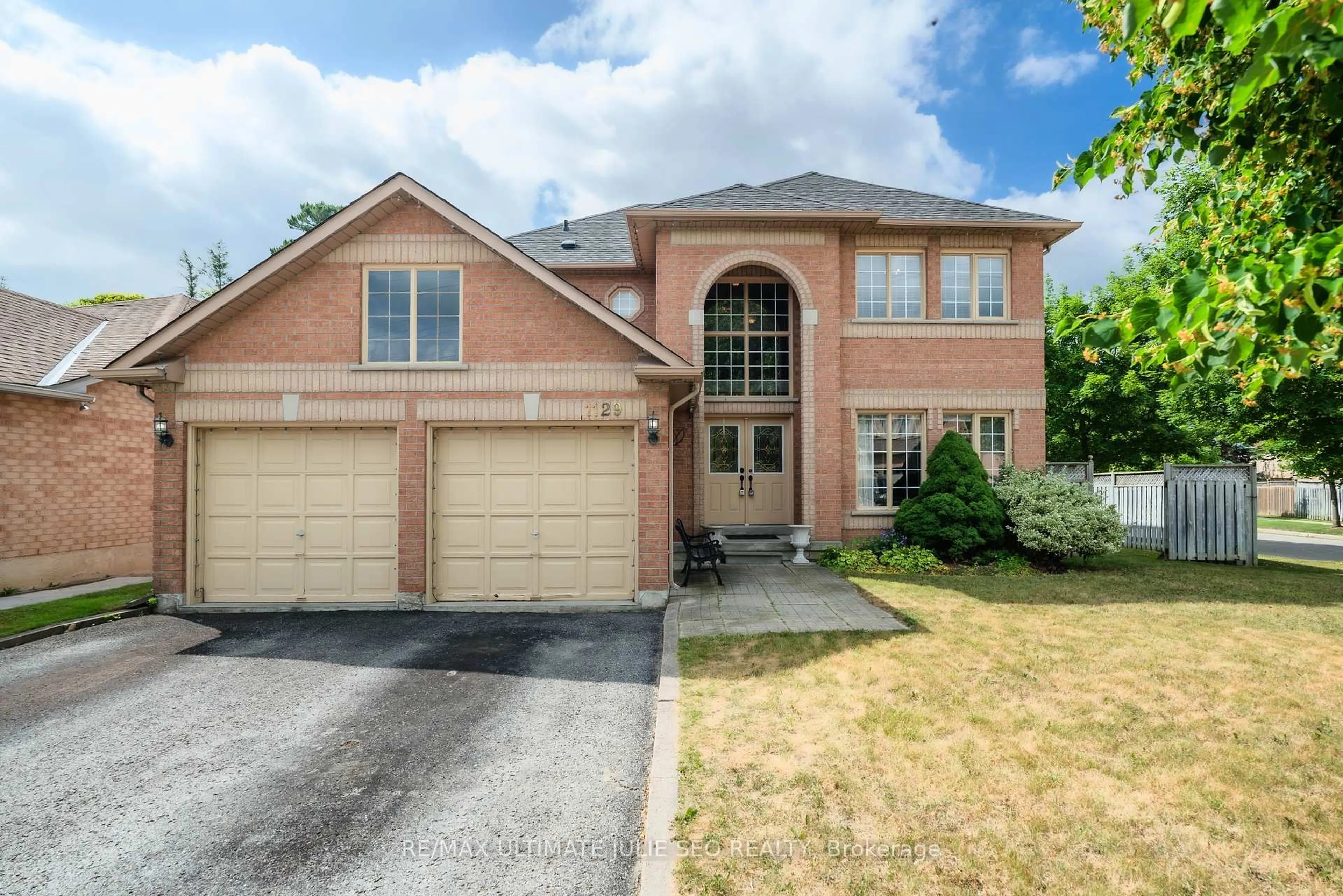 Home with brick exterior material, street for 1129 Gossamer Dr, Pickering Ontario L1X 2T8