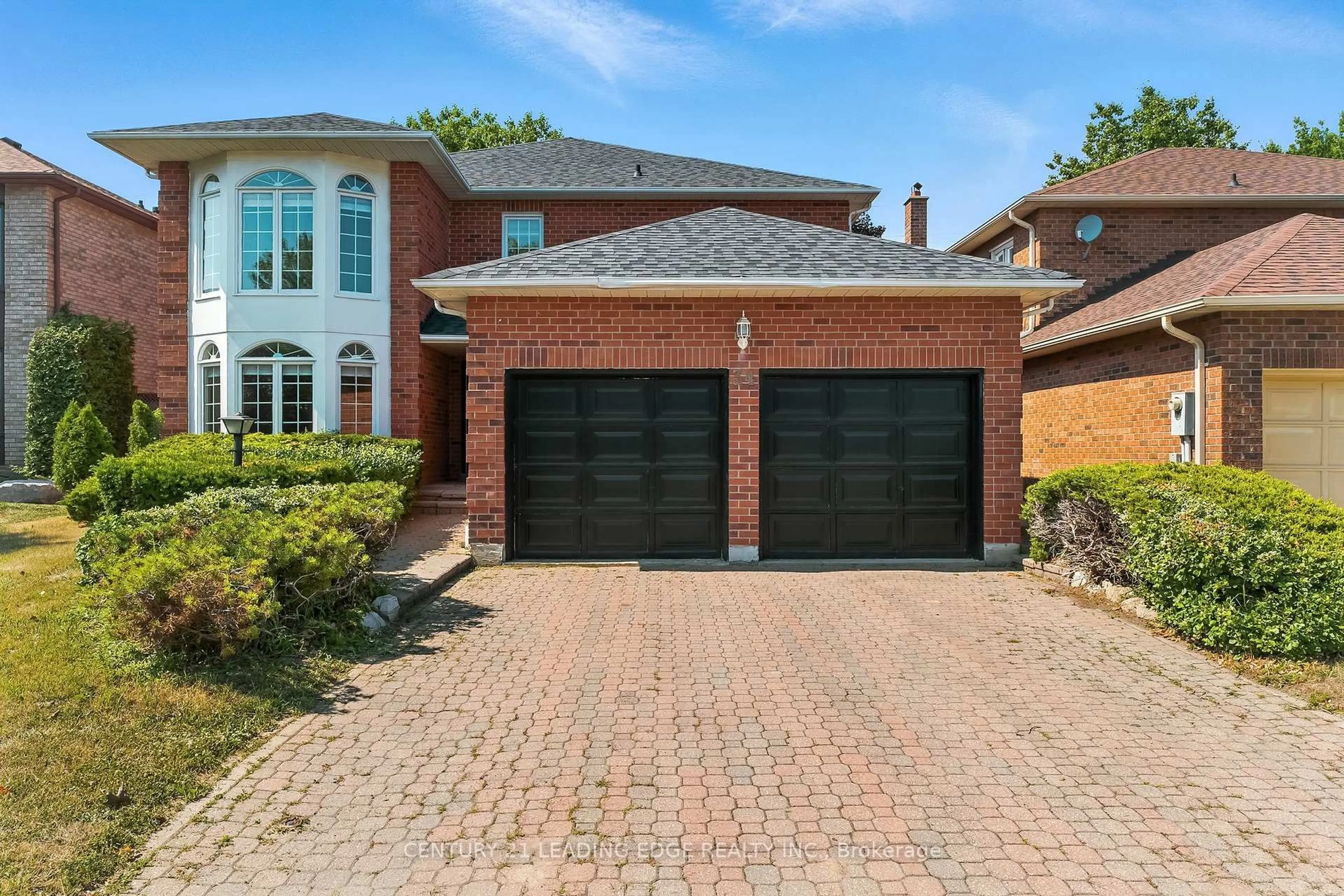 Home with brick exterior material, street for 34 HENDERSON Dr, Whitby Ontario L1N 7Y6