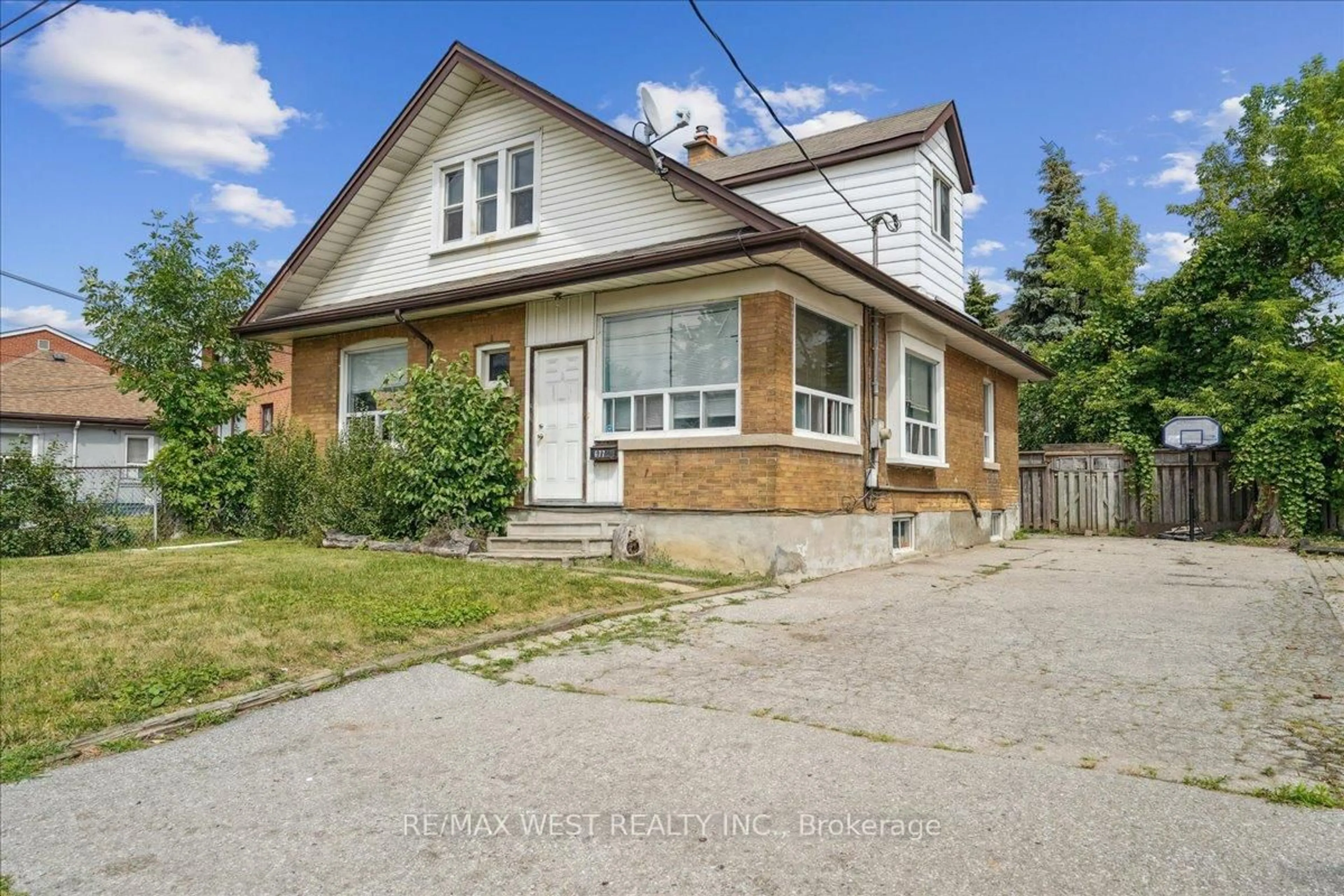 Home with brick exterior material, street for 677 Danforth Rd, Toronto Ontario M1K 1G4