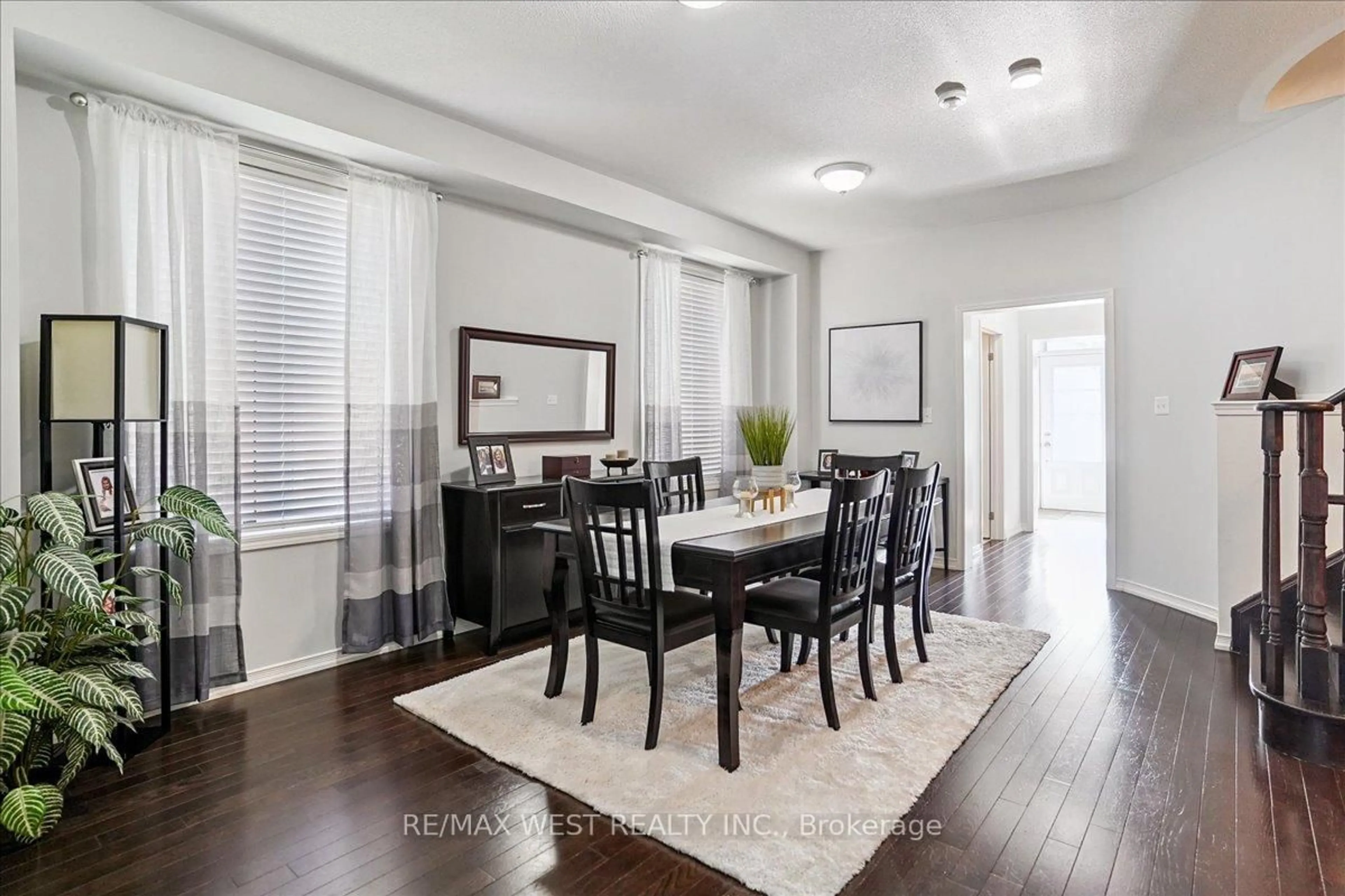 Dining room, wood/laminate floor for 363 Windfields Farm Dr, Oshawa Ontario L1H 7K4