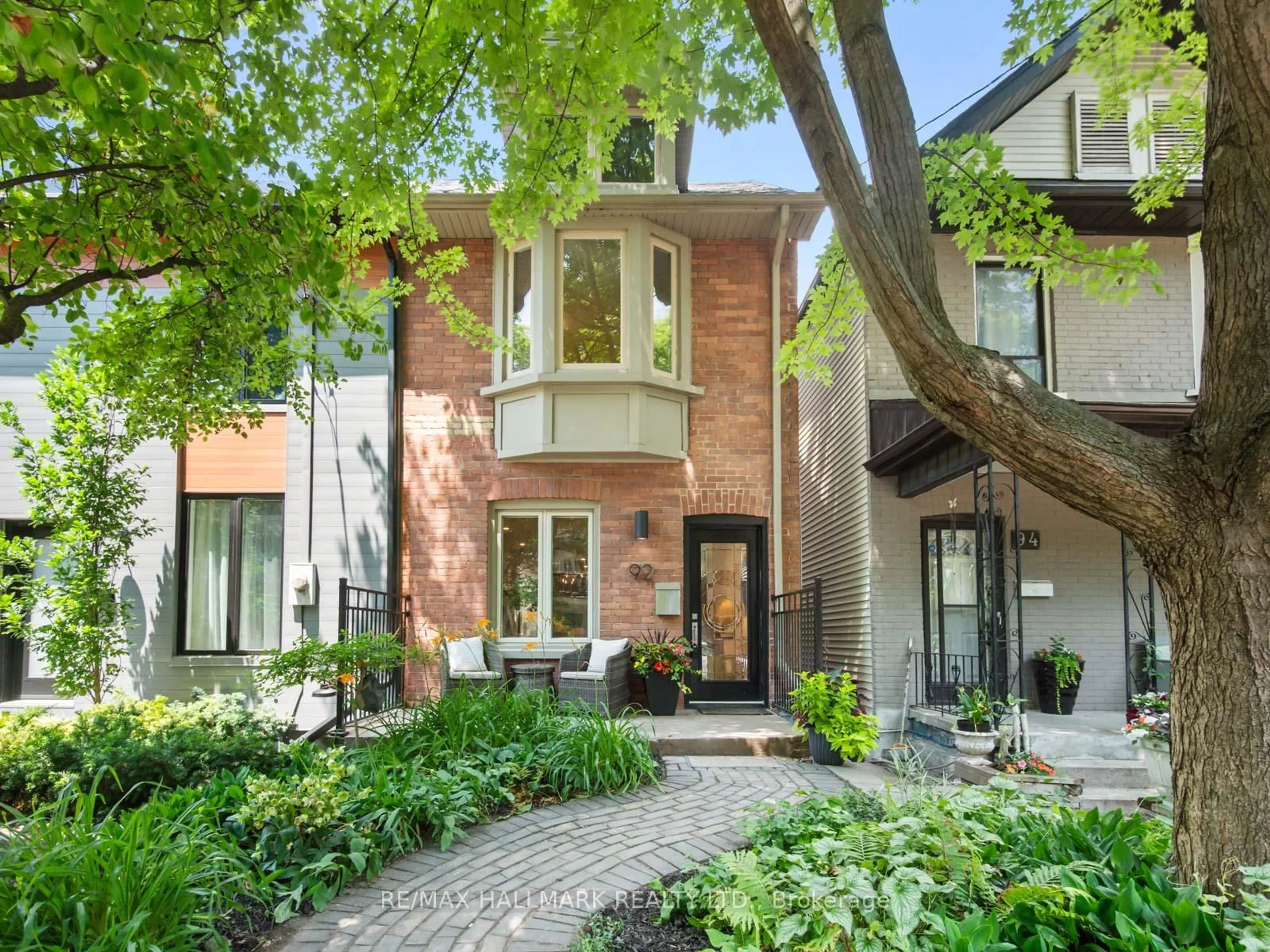 Home with brick exterior material, street for 92 Wroxeter Ave, Toronto Ontario M4J 1E6