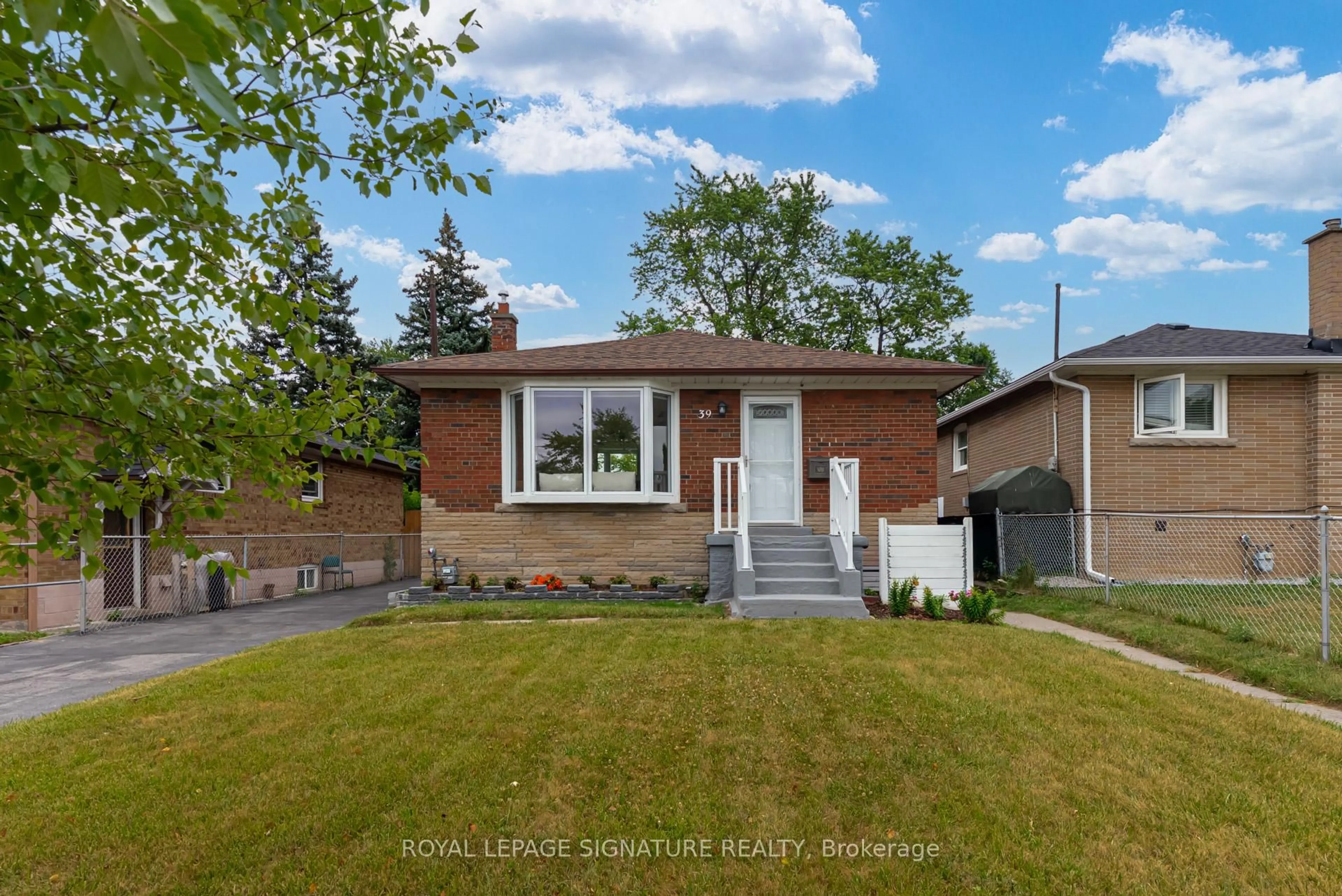 Home with brick exterior material, street for 39 Century Dr, Toronto Ontario M1K 4J7
