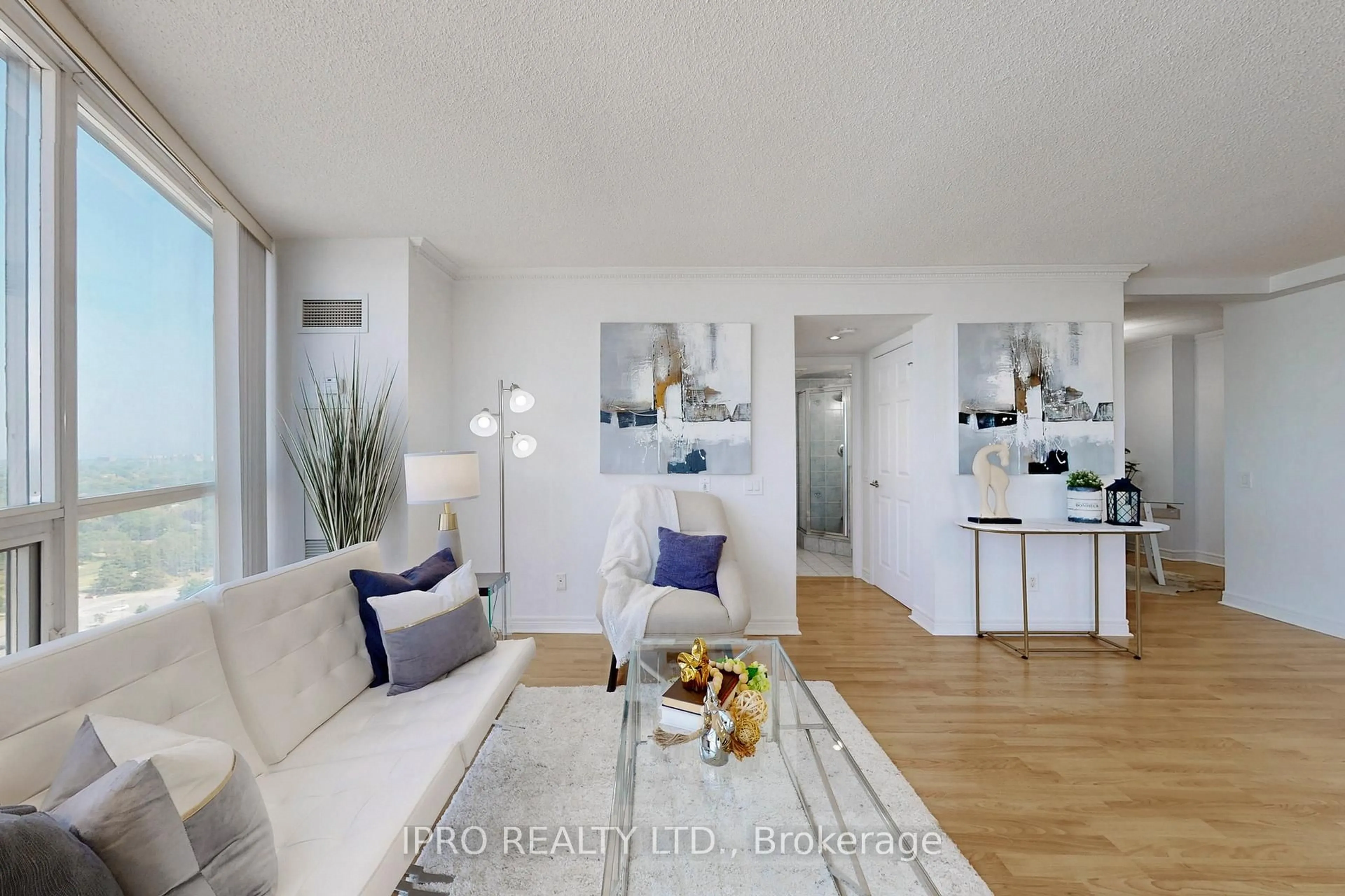 Living room with furniture, wood/laminate floor for 83 Borough Dr #2106, Toronto Ontario M1P 5E4