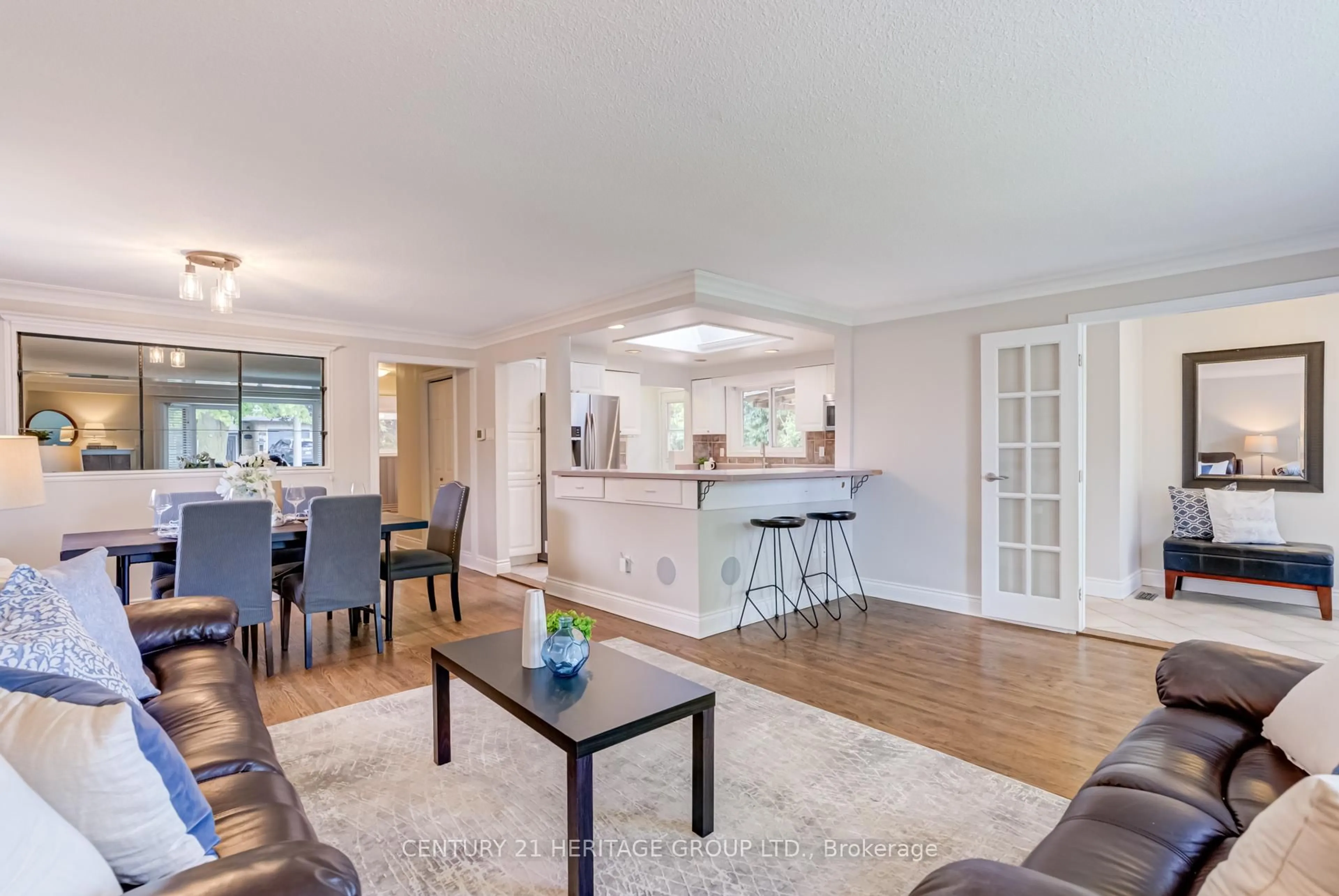 Open concept kitchen, wood/laminate floor for 17 Cowling Cres, Ajax Ontario L1S 2Z6