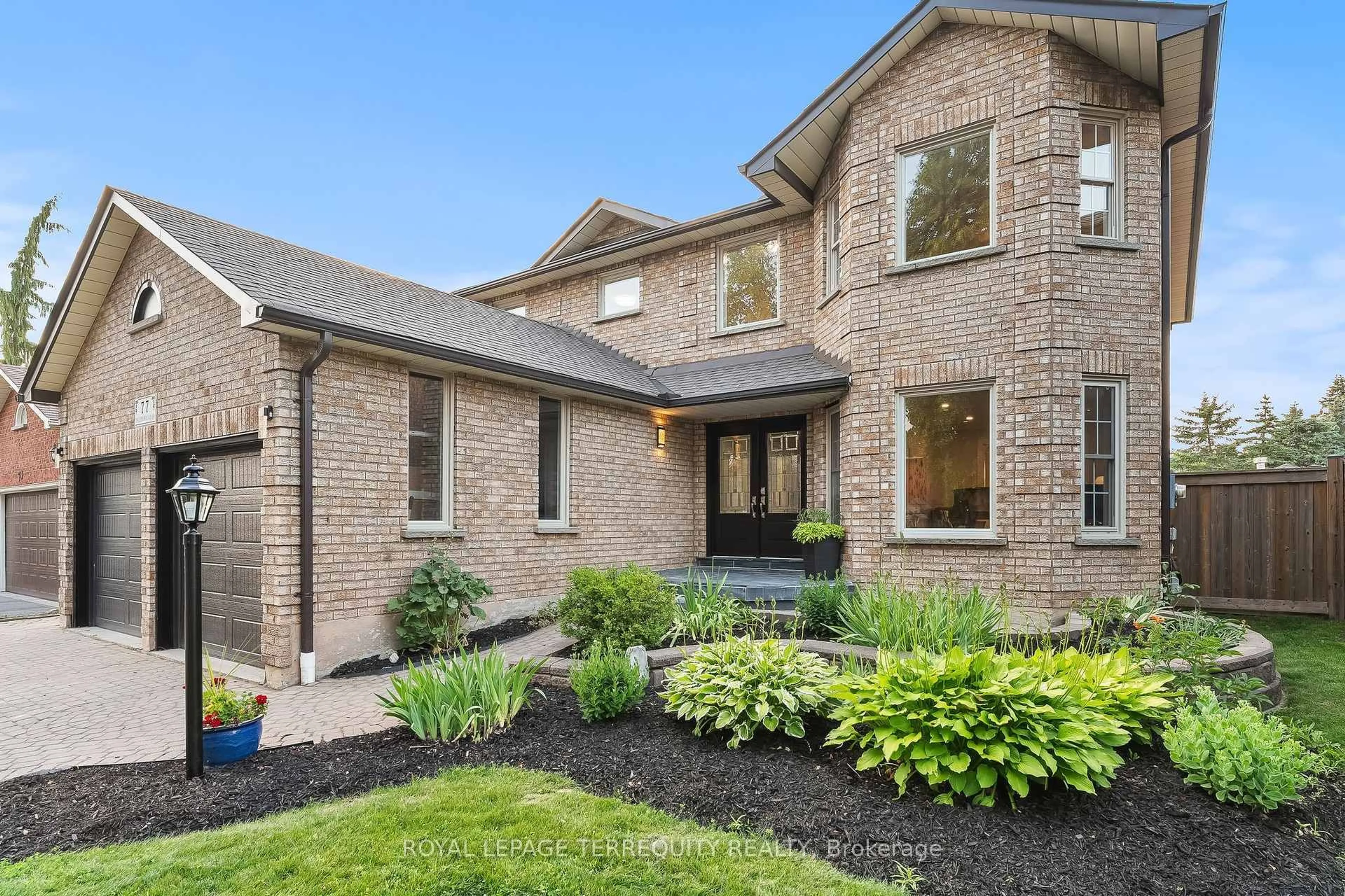 Home with brick exterior material, street for 77 Ingleborough Dr, Whitby Ontario L1N 8J4