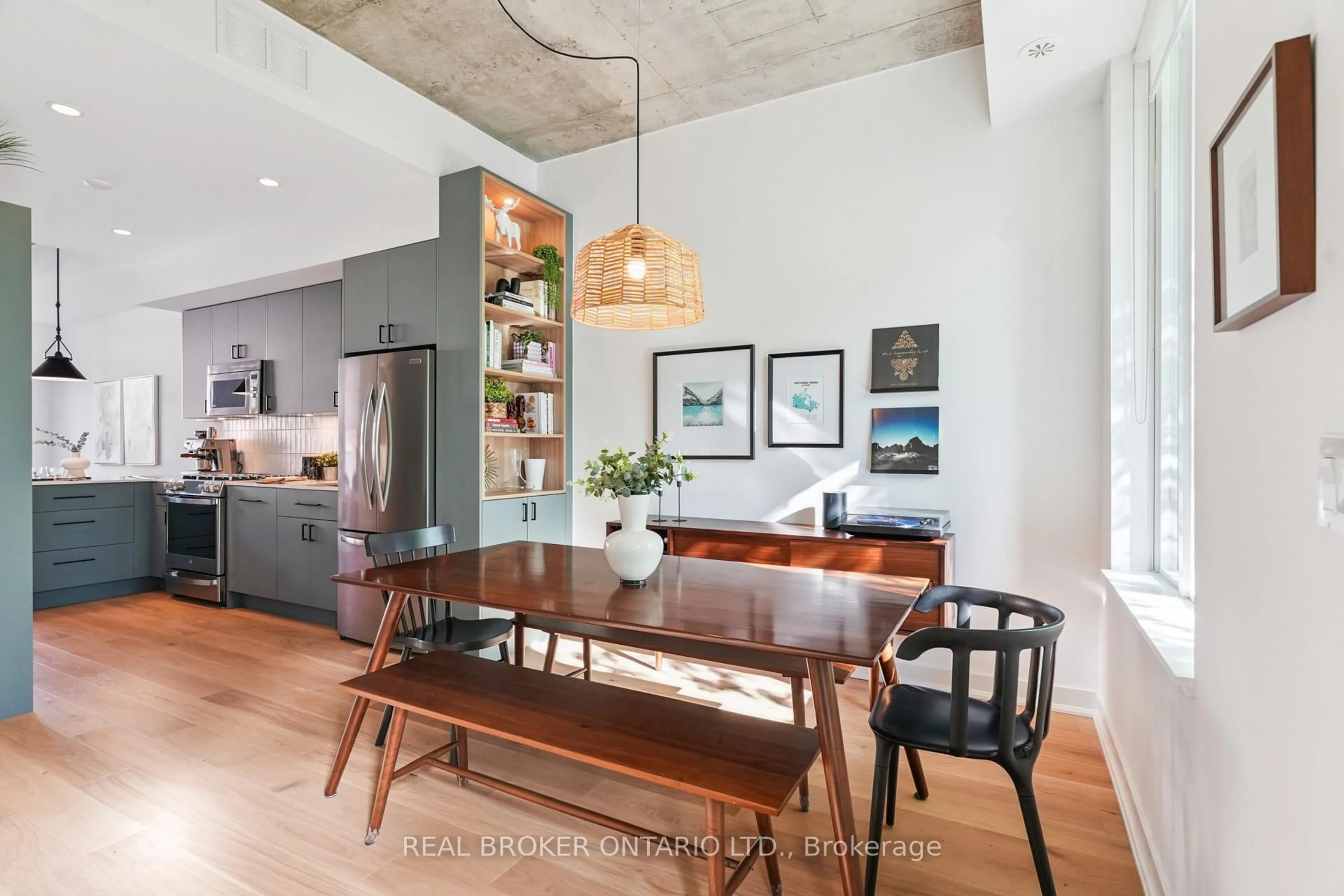 Open concept kitchen, cement floor for 1190 Dundas St #335, Toronto Ontario M4M 0C5