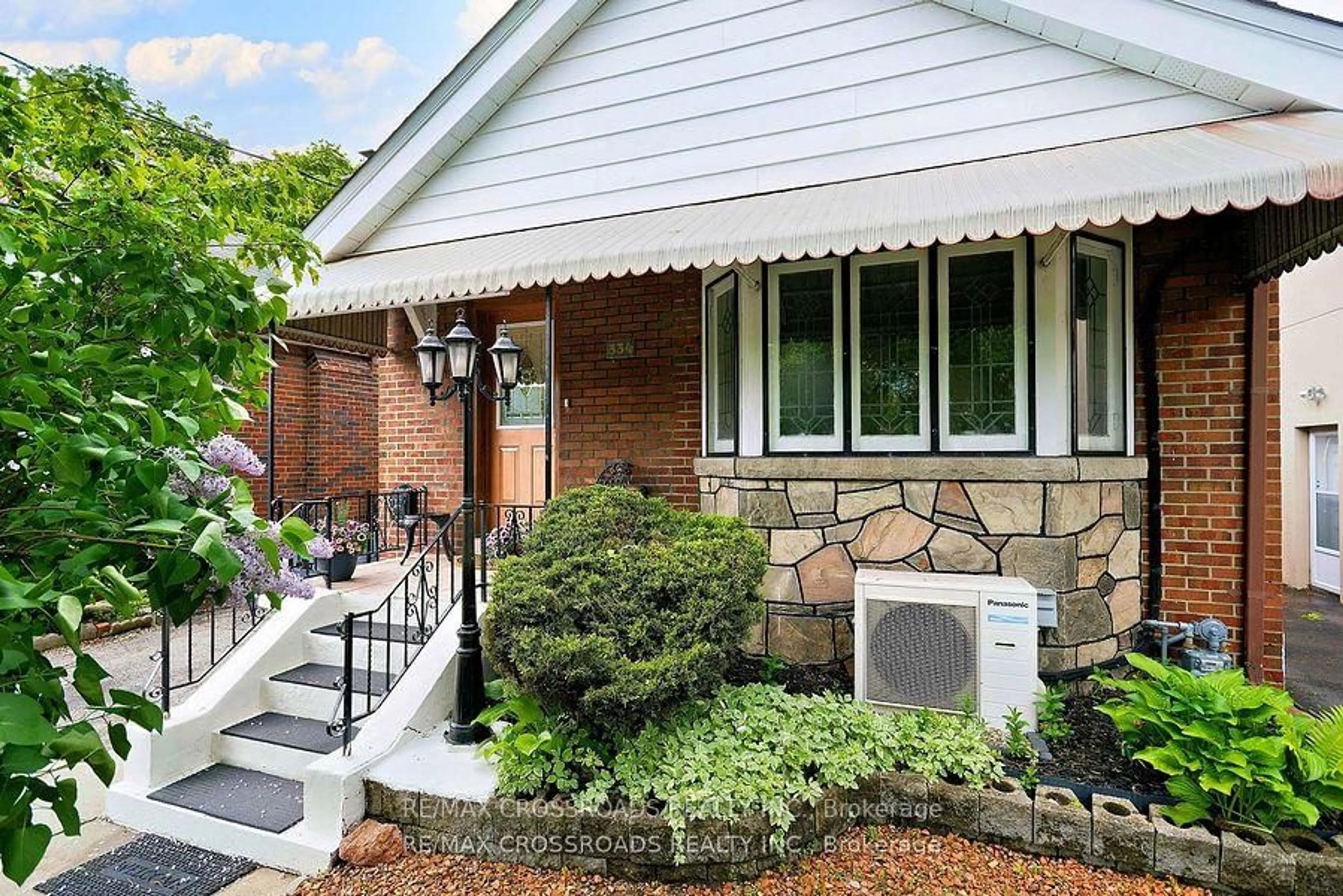 Home with brick exterior material, street for 334 O'Connor Dr, Toronto Ontario M4J 2V3