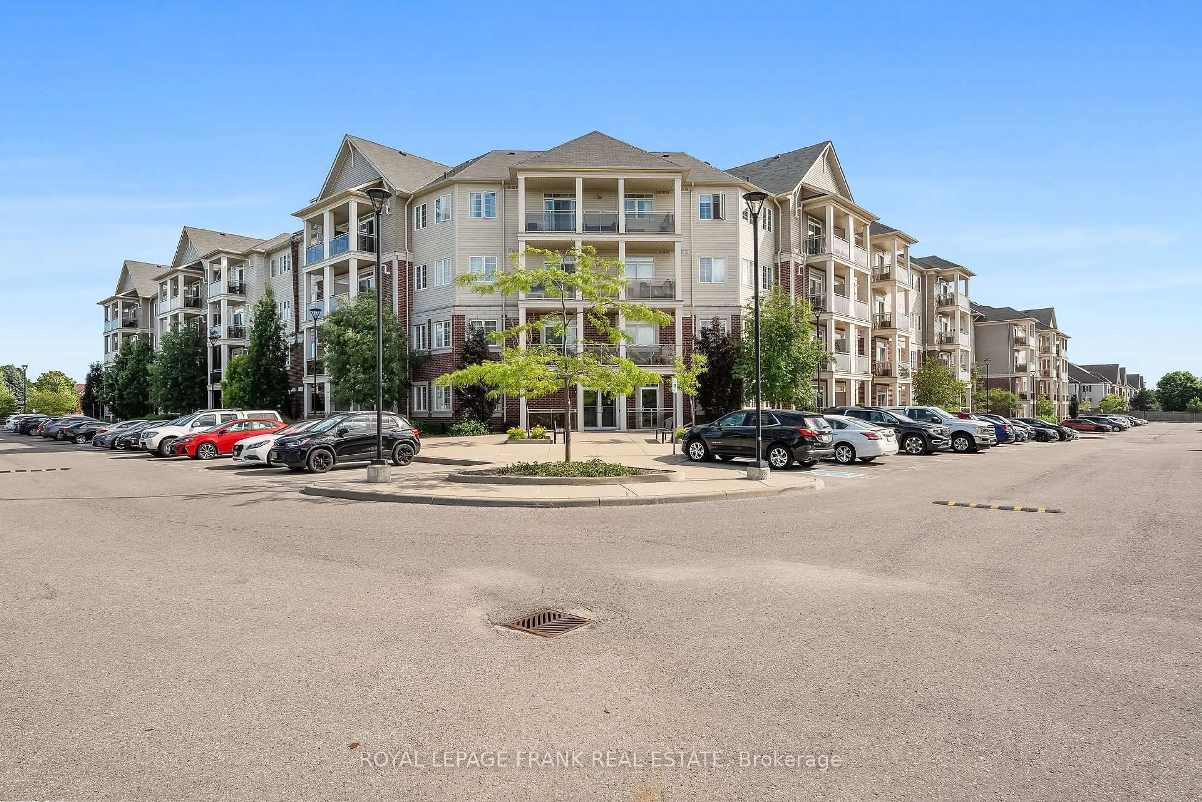 A pic from outside/outdoor area/front of a property/back of a property/a pic from drone, unknown for 80 Aspen Springs Dr #405, Clarington Ontario L1C 0V4