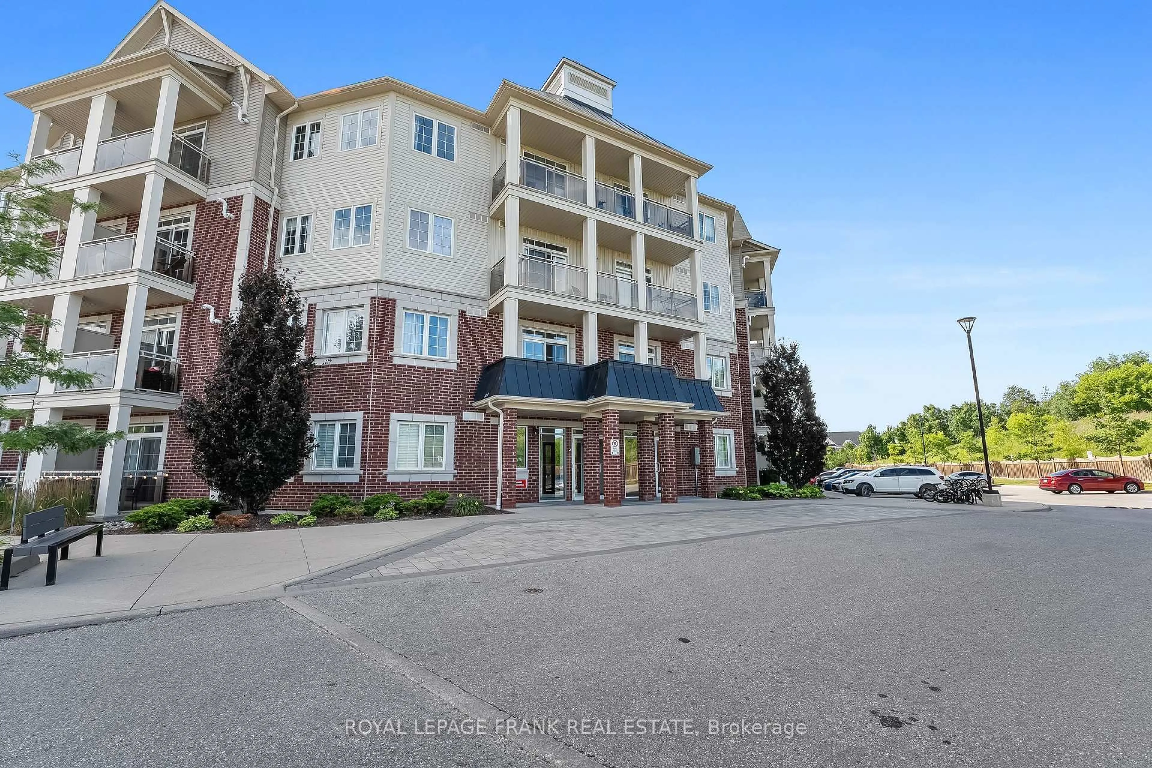 A pic from outside/outdoor area/front of a property/back of a property/a pic from drone, water/lake/river/ocean view for 80 Aspen Springs Dr #405, Clarington Ontario L1C 0V4