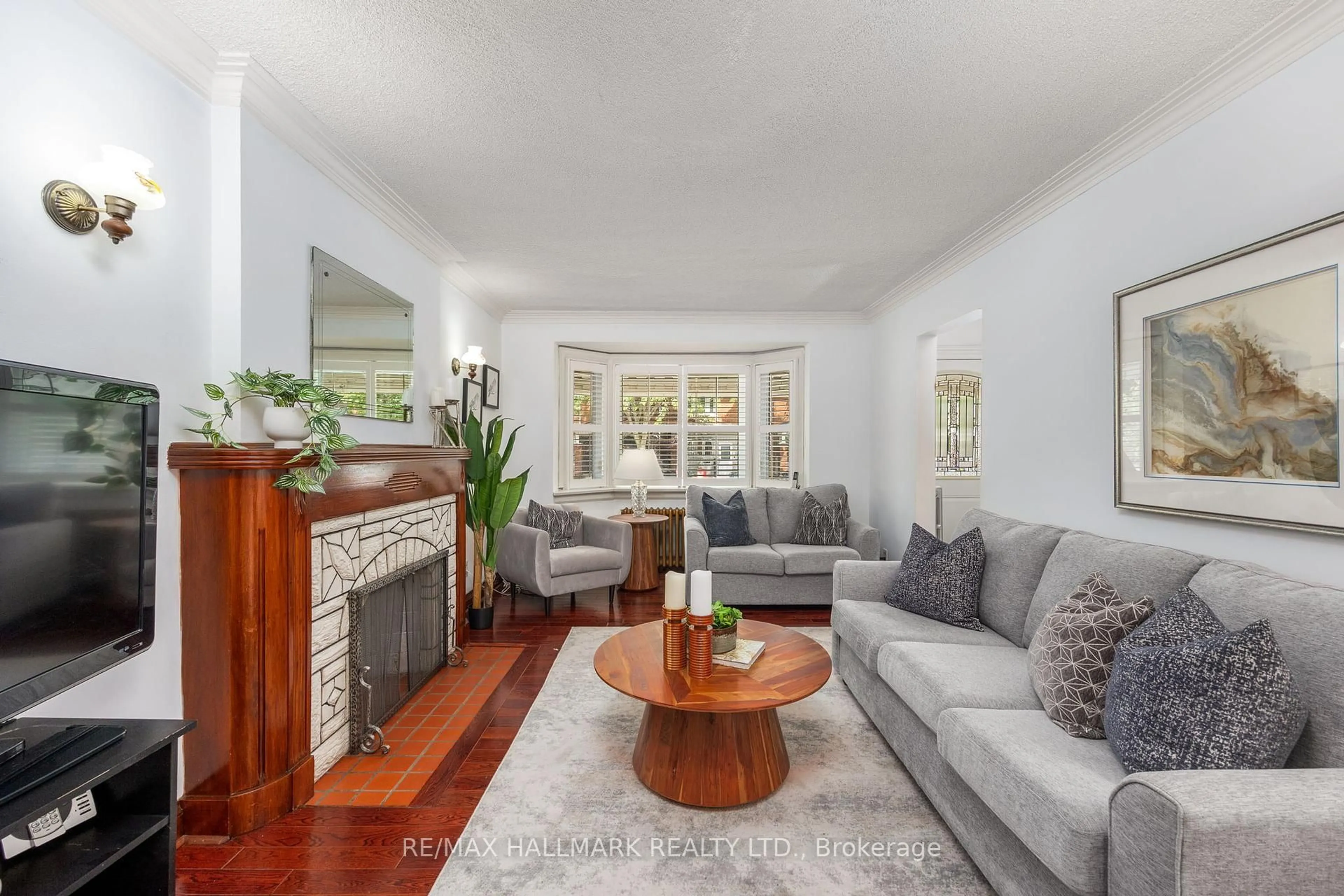 Living room with furniture, unknown for 236 Dewhurst Blvd, Toronto Ontario M4J 3K5