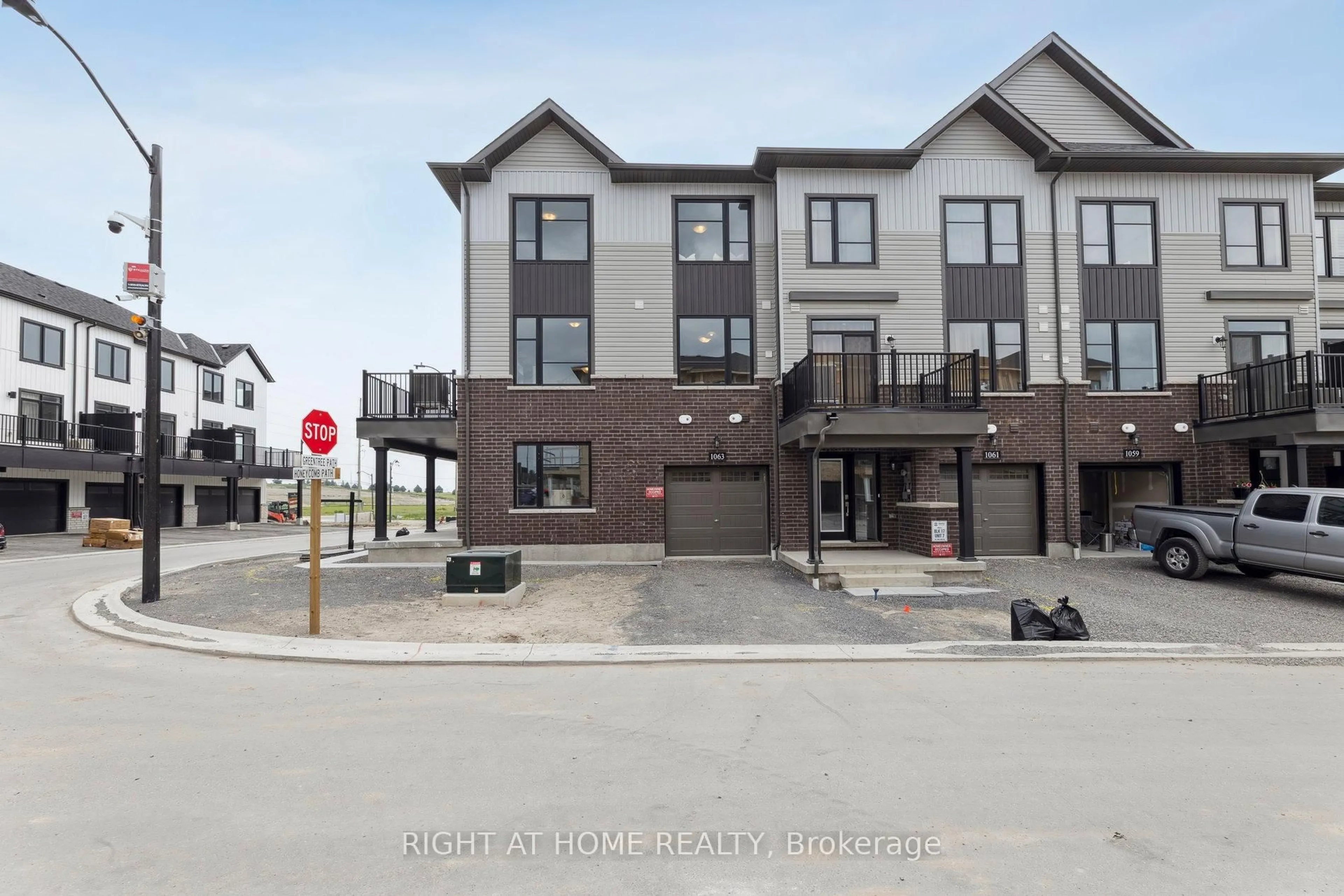 A pic from outside/outdoor area/front of a property/back of a property/a pic from drone, unknown for 1063 Honeycomb Path, Oshawa Ontario L1H 8L7