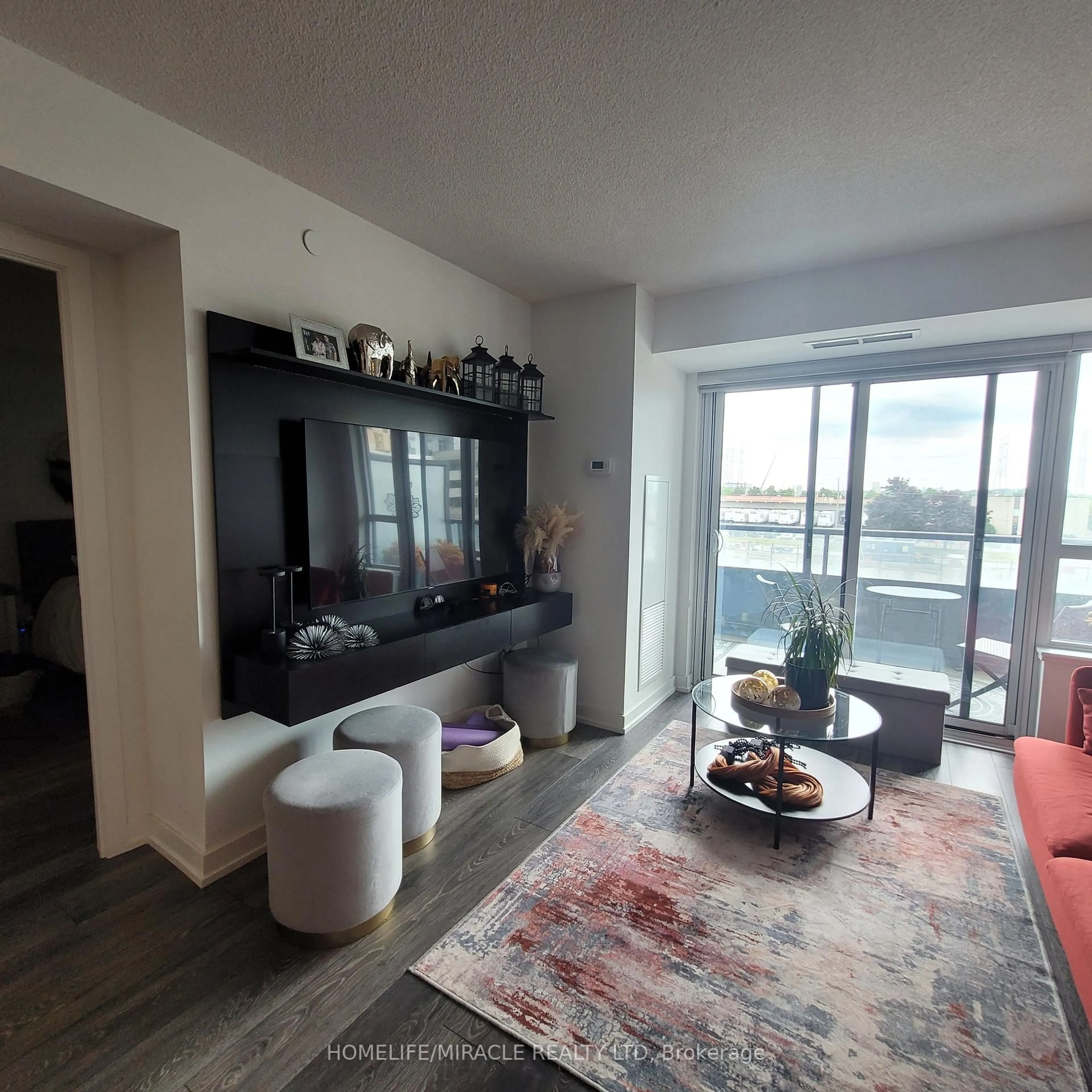 Living room with furniture, unknown for 1455 Celebration Dr #302, Pickering Ontario L1W 1L8