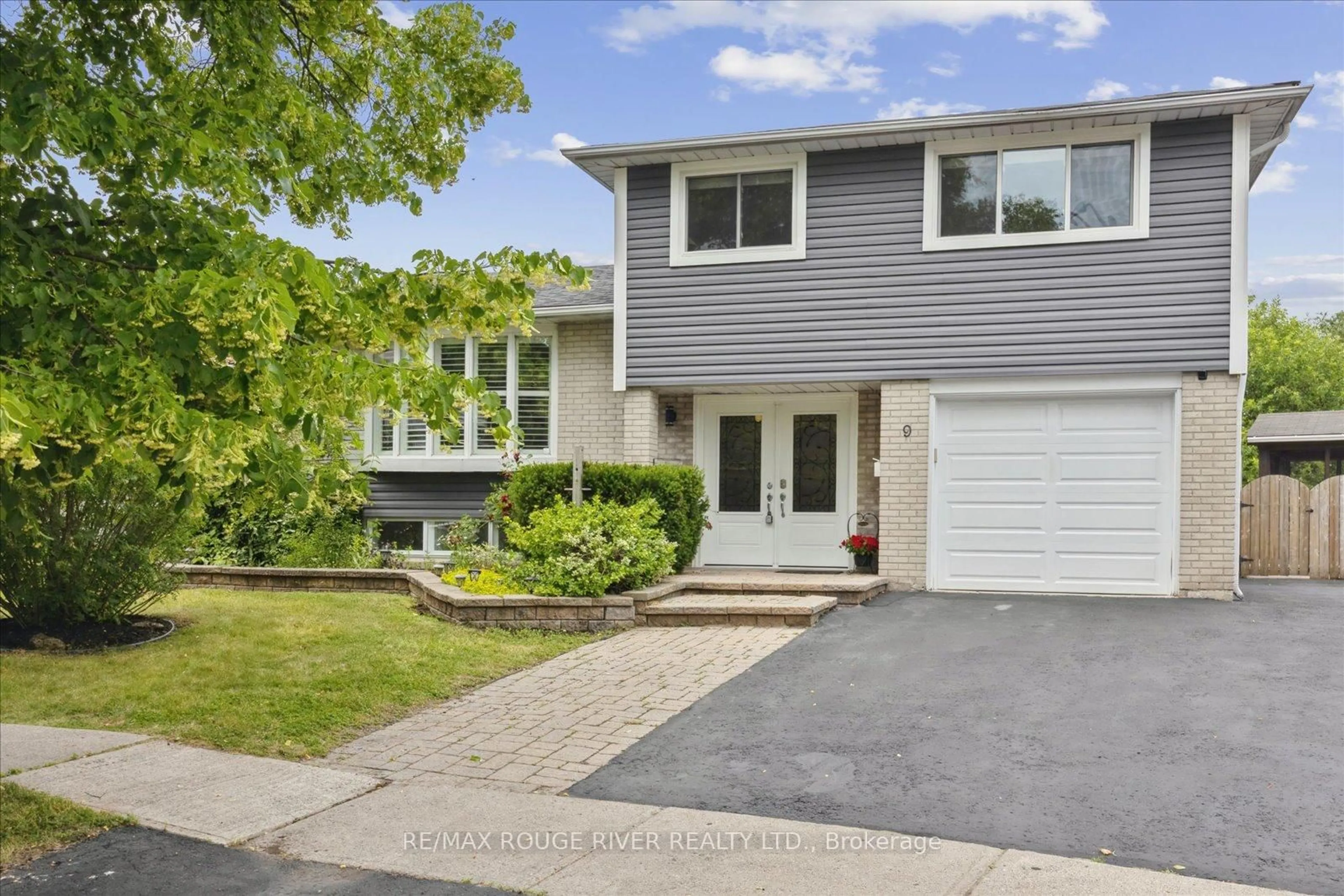 Home with vinyl exterior material, street for 9 Cowling Cres, Ajax Ontario L1S 2Z6