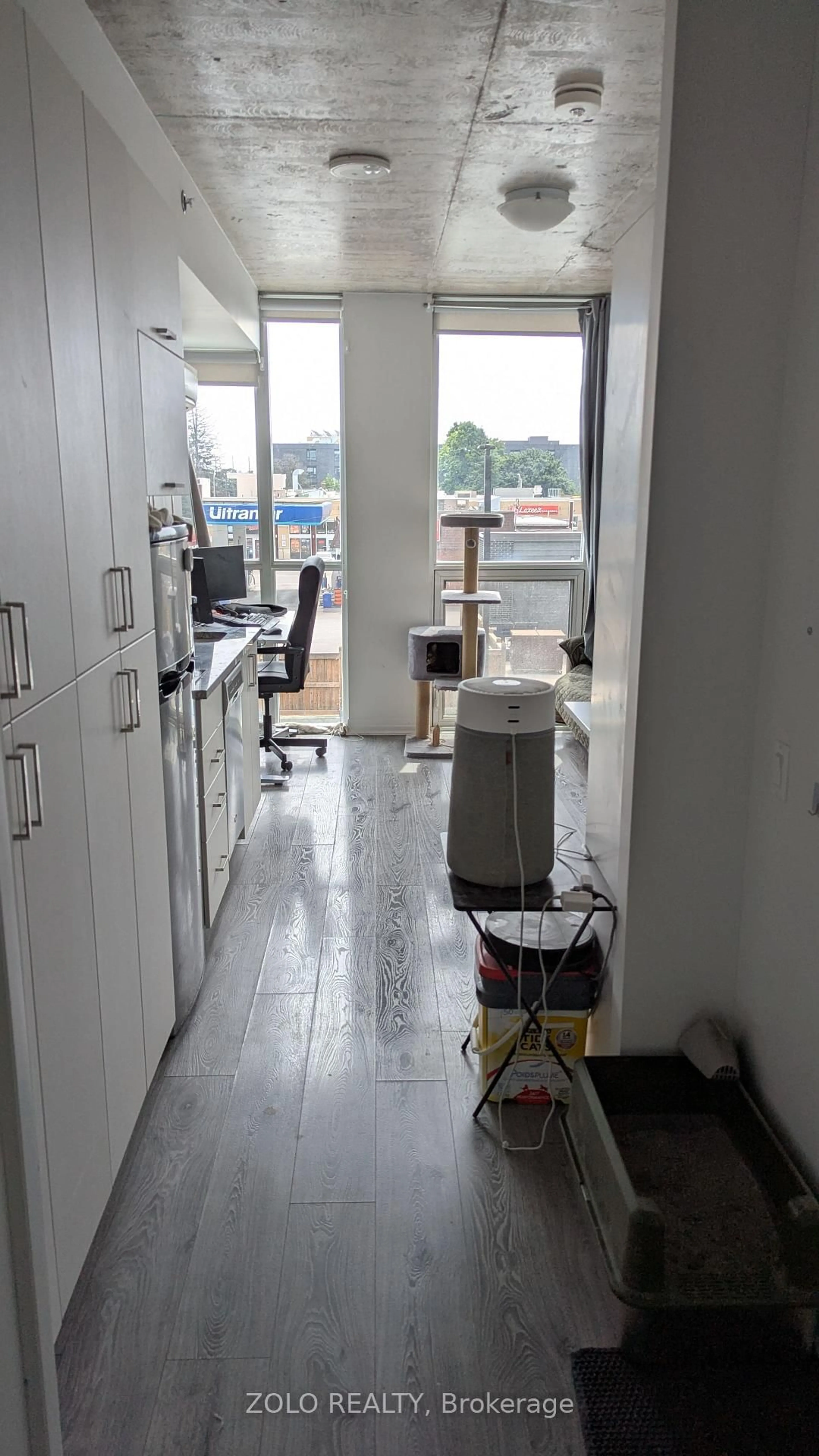 Kitchen with laundary machines, floor is not visible for 1900 Simcoe St #237, Oshawa Ontario L1G 0C1