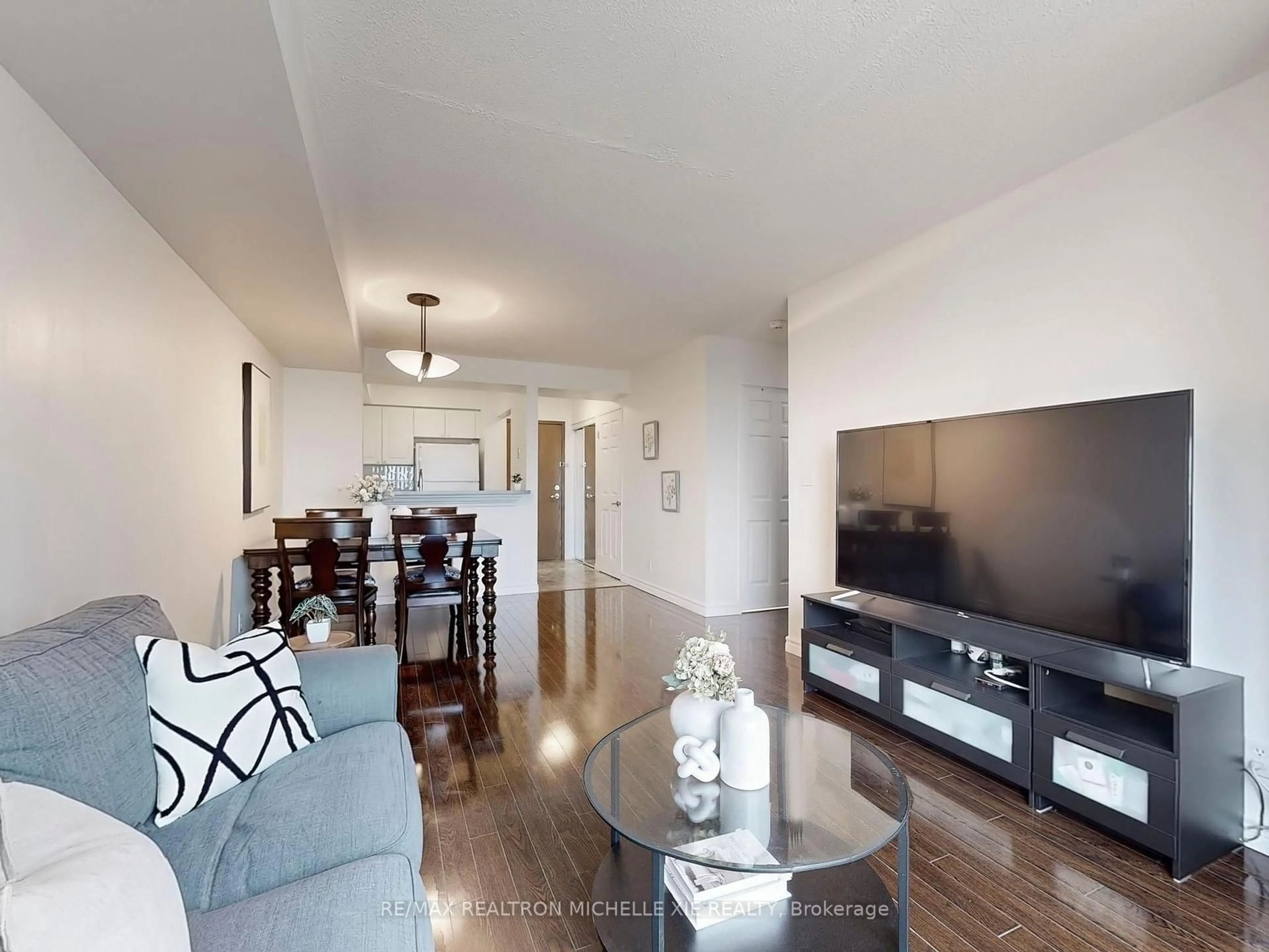 Living room with furniture, wood/laminate floor for 1 Lee Centre Dr #Ph201, Toronto Ontario M1H 3J2
