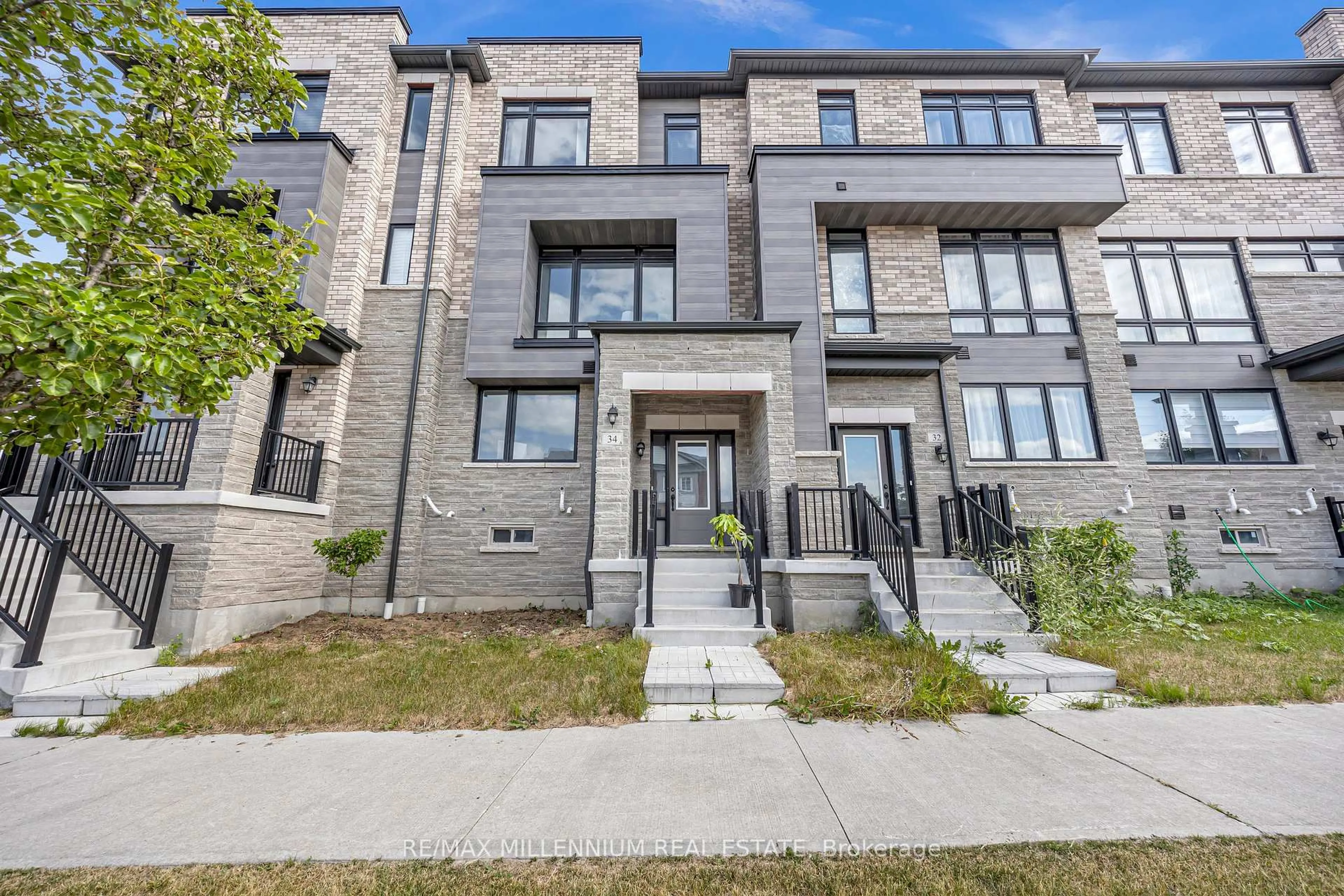 Home with brick exterior material, street for 34 Lord Dr, Ajax Ontario L1S 0B9