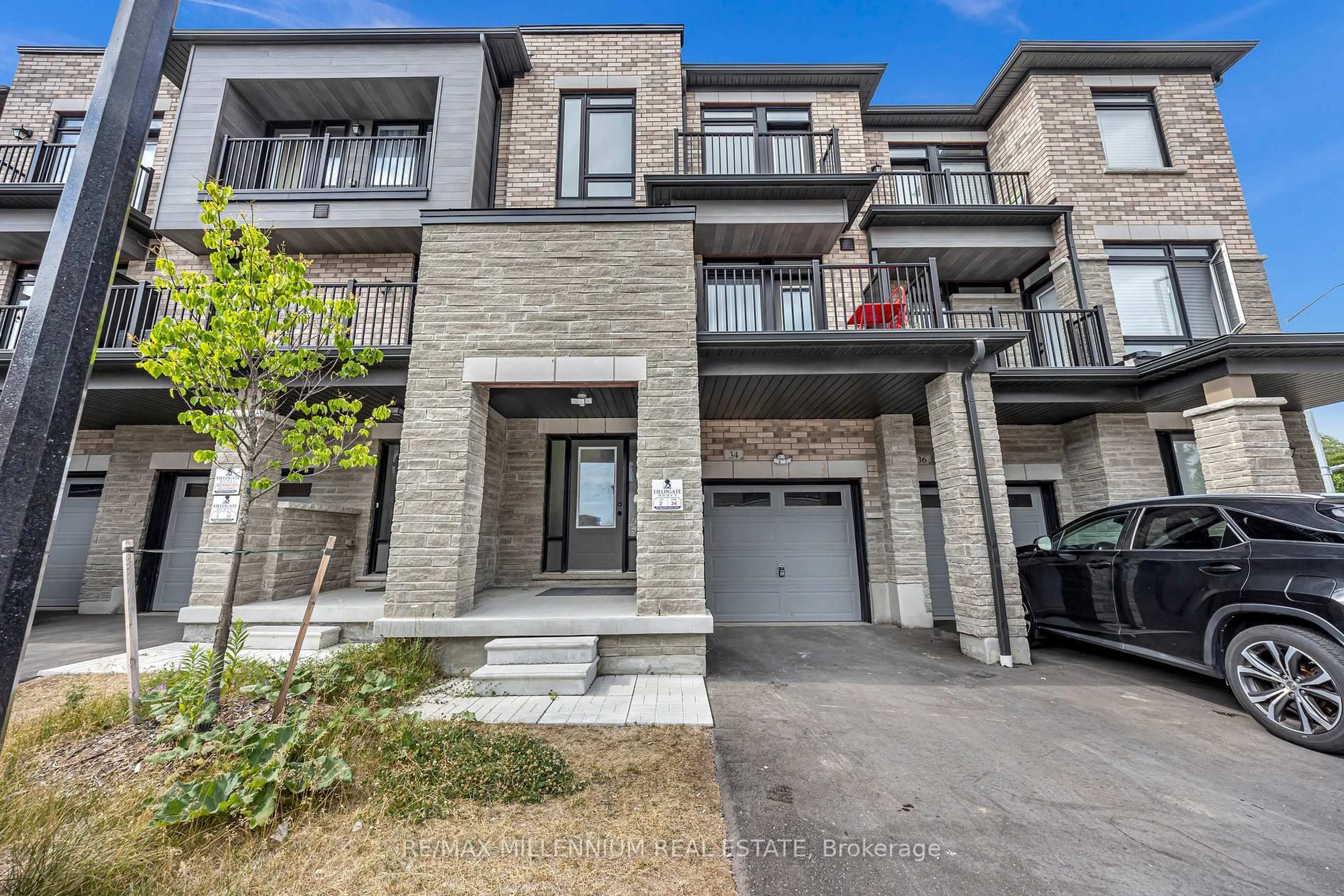 Home with brick exterior material, street for 34 Lord Dr, Ajax Ontario L1S 0B9