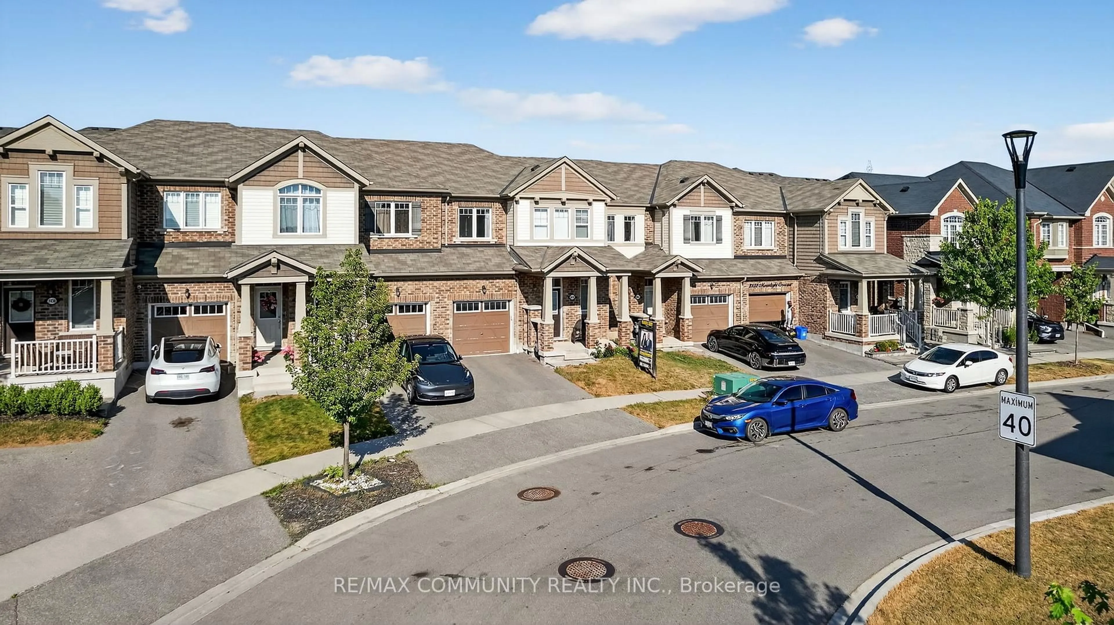 A pic from outside/outdoor area/front of a property/back of a property/a pic from drone, street for 2434 Moonlight Cres, Pickering Ontario L1X 0E9