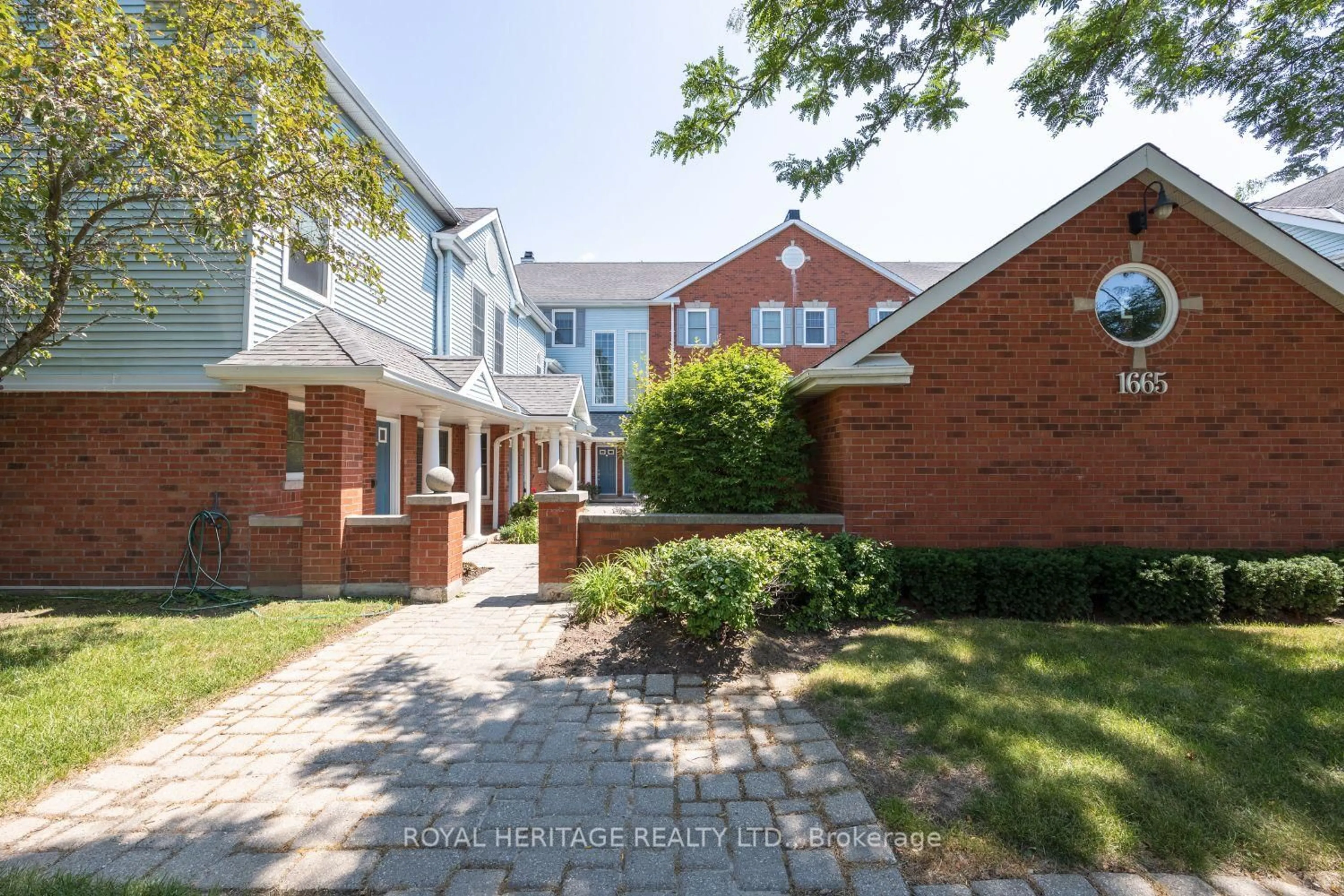Home with brick exterior material, street for 1665 Nash Dr #E-16, Clarington Ontario L1E 1S8