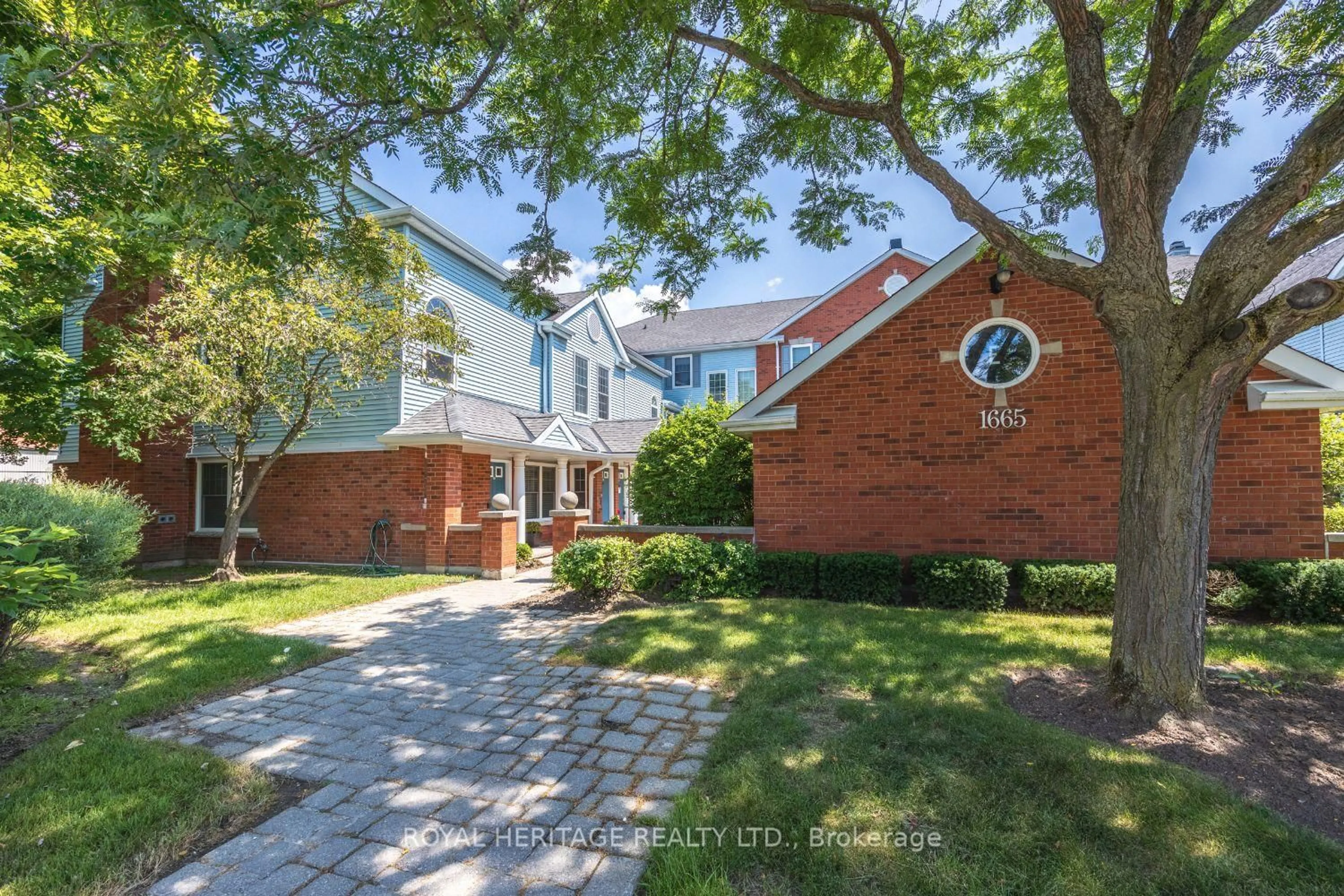 Home with brick exterior material, street for 1665 Nash Dr #E-16, Clarington Ontario L1E 1S8