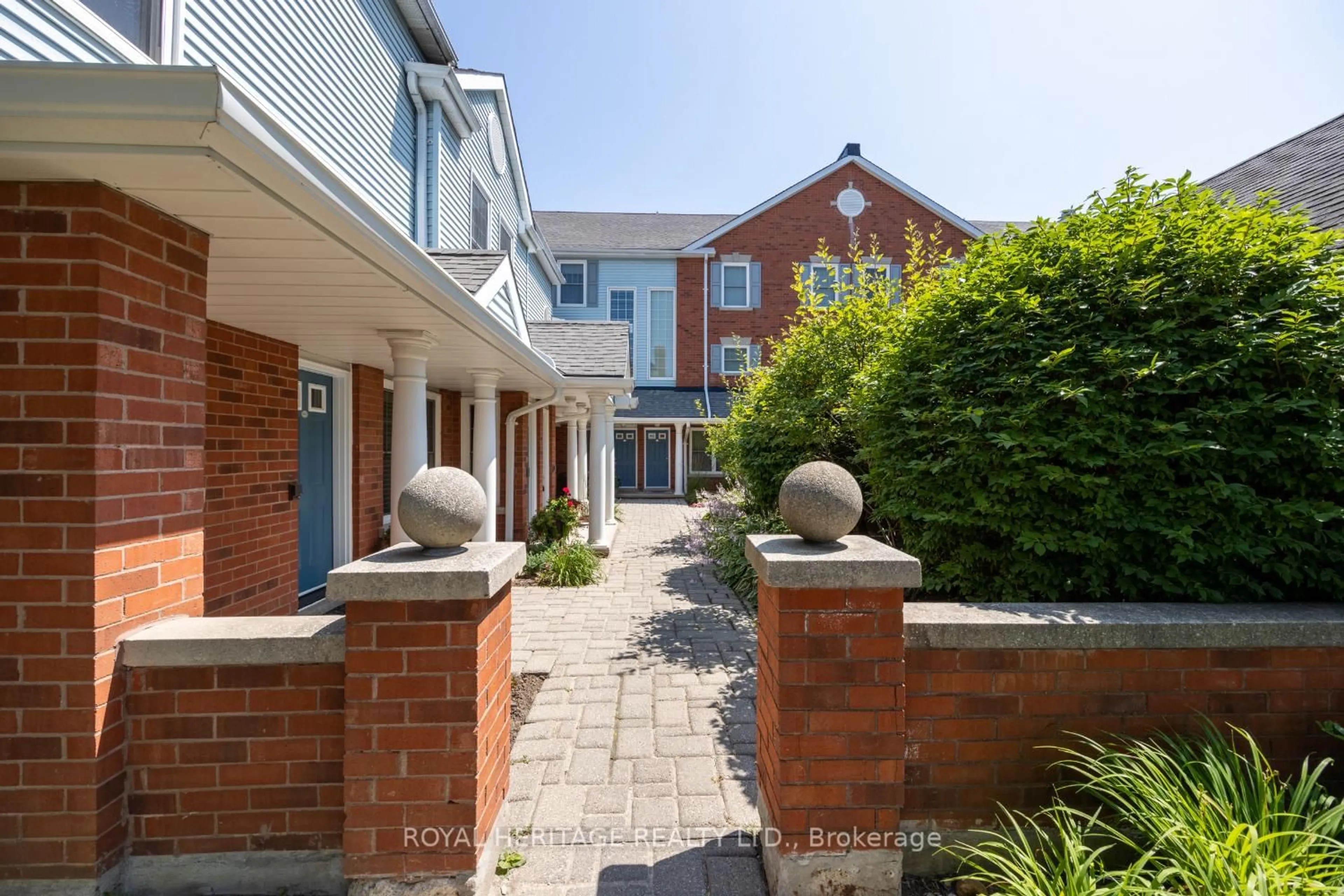 A pic from outside/outdoor area/front of a property/back of a property/a pic from drone, street for 1665 Nash Dr #E-16, Clarington Ontario L1E 1S8