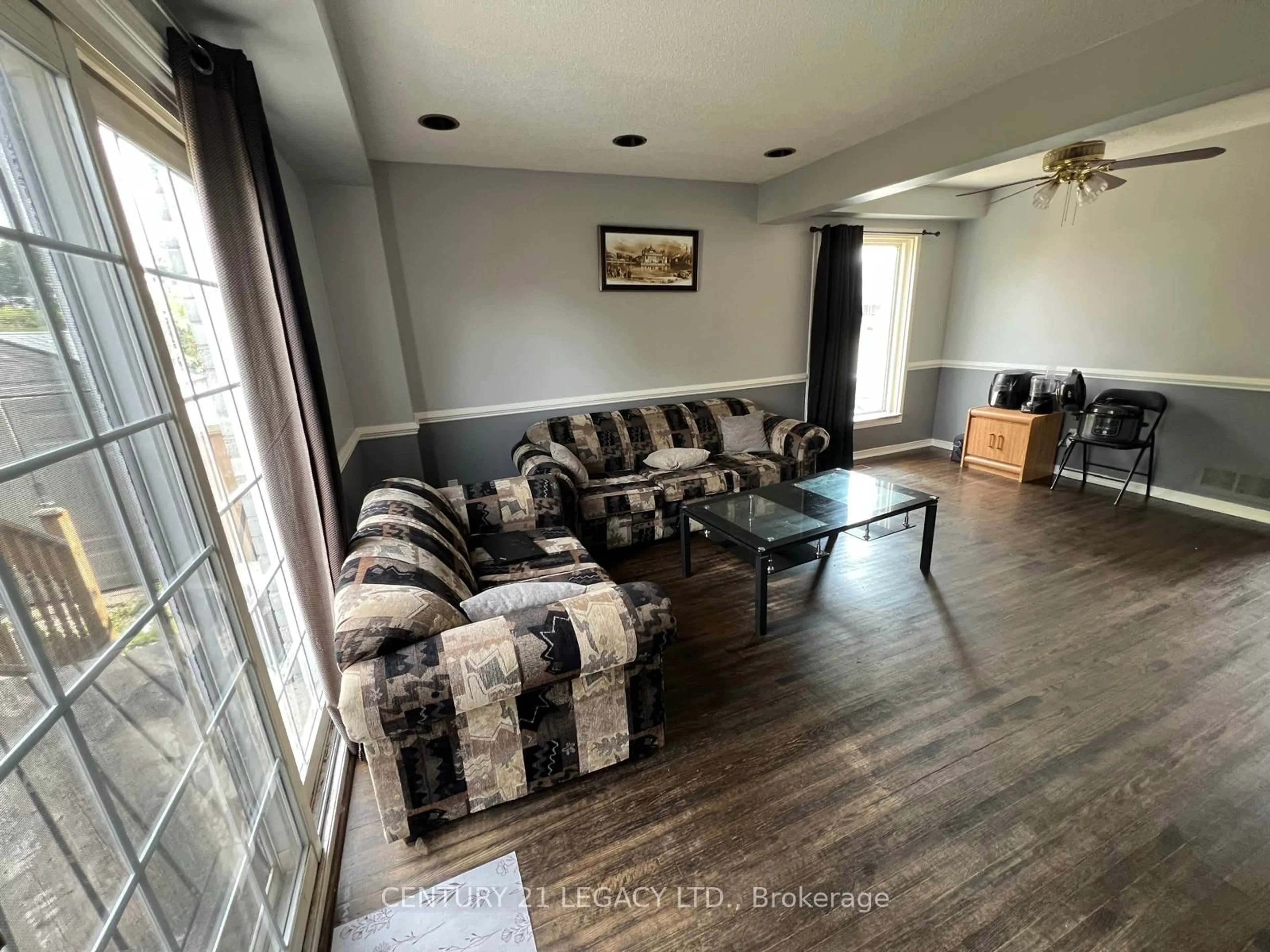 Living room with furniture, wood/laminate floor for 1544 Connery Cres, Oshawa Ontario L1J 8G1