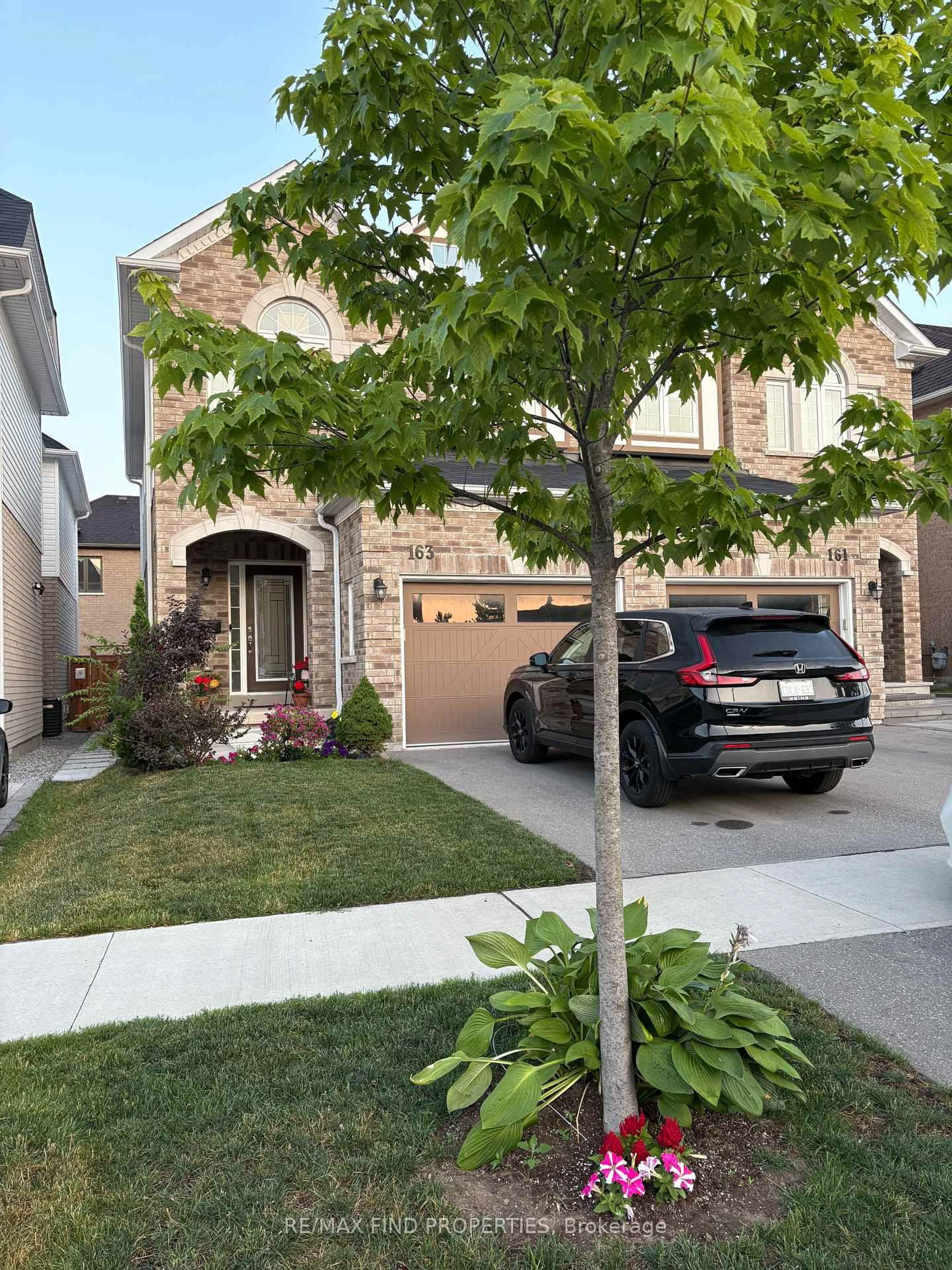 Home with brick exterior material, street for 163 Whitefoot Cres, Ajax Ontario L1Z 2E3
