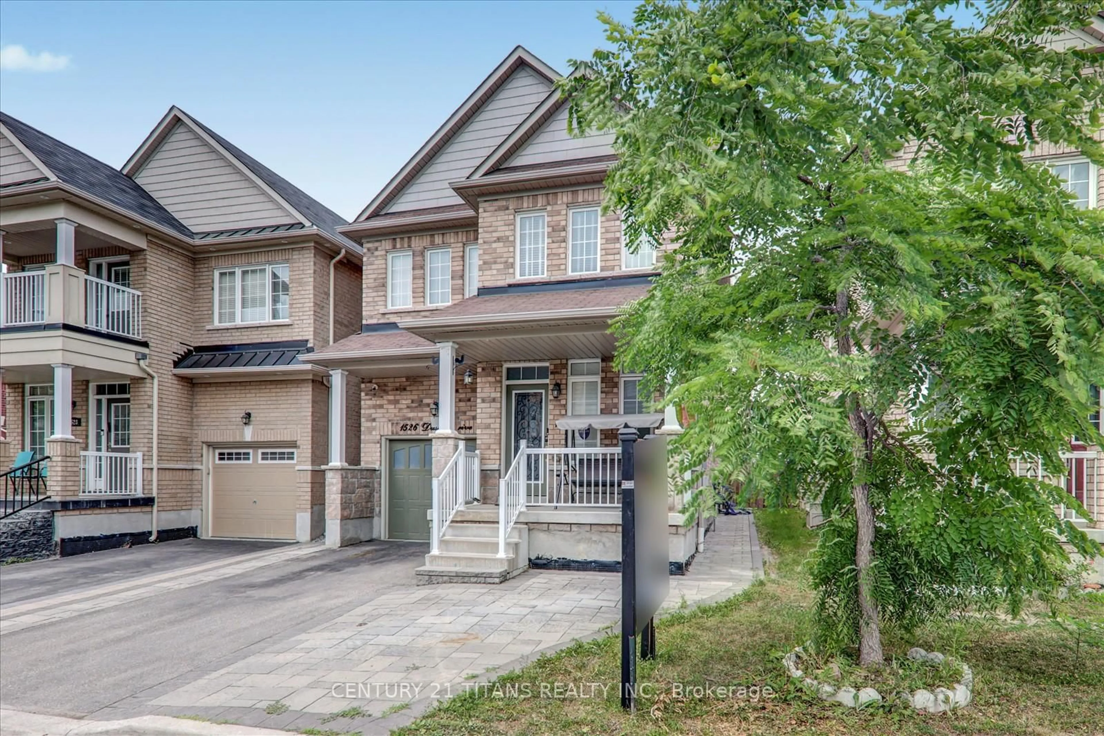 Home with brick exterior material, street for 1526 Dusty Dr, Pickering Ontario L1X 0C9