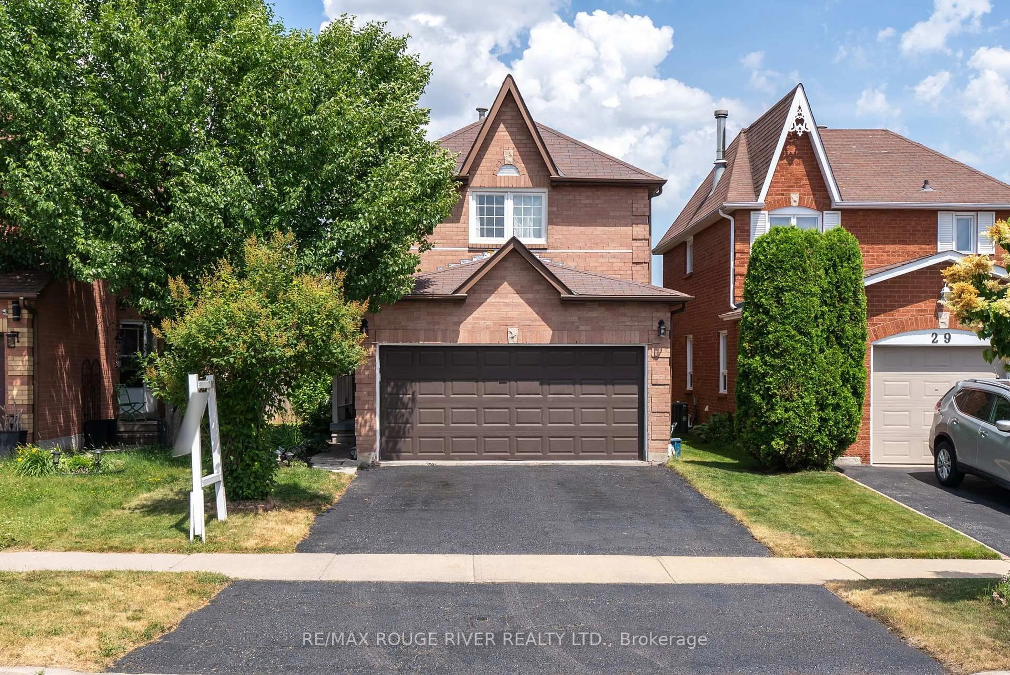 Home with brick exterior material, street for 31 Sharp Cres, Ajax Ontario L1T 3R1