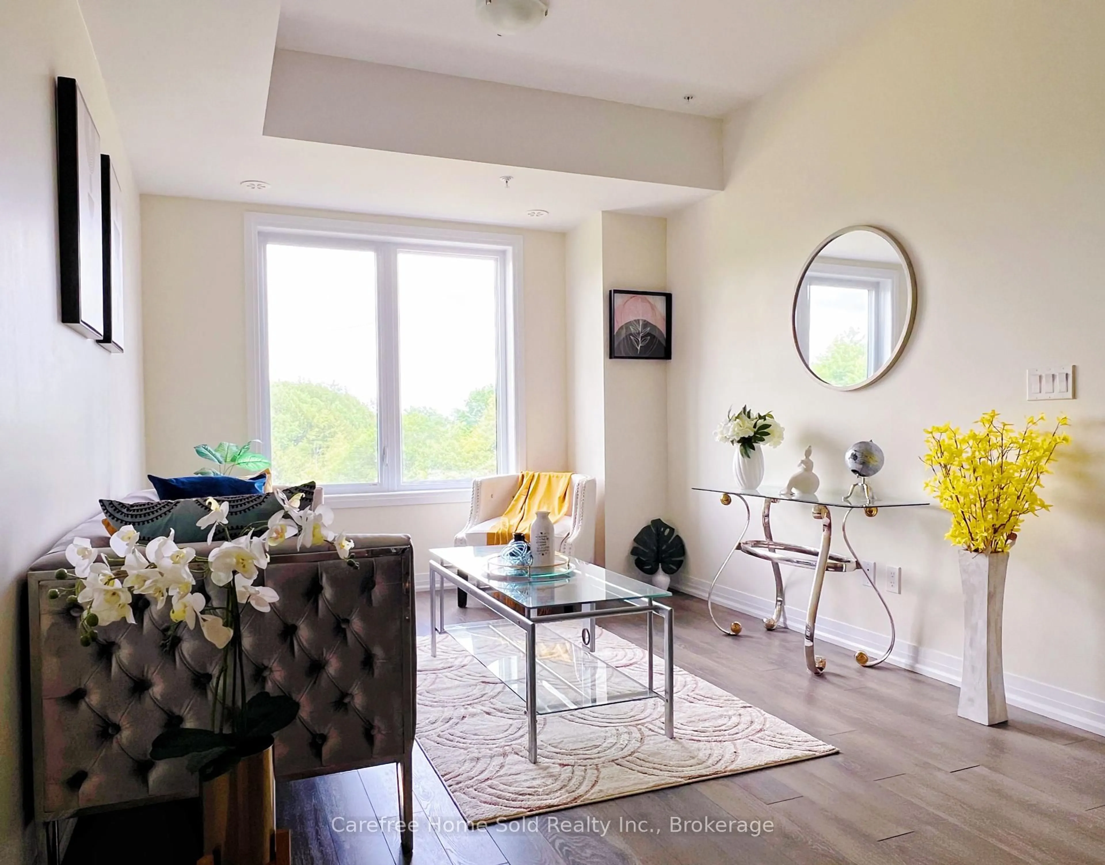 Living room with furniture, wood/laminate floor for 2635 William Jackson Dr #814, Pickering Ontario L1X 0L4