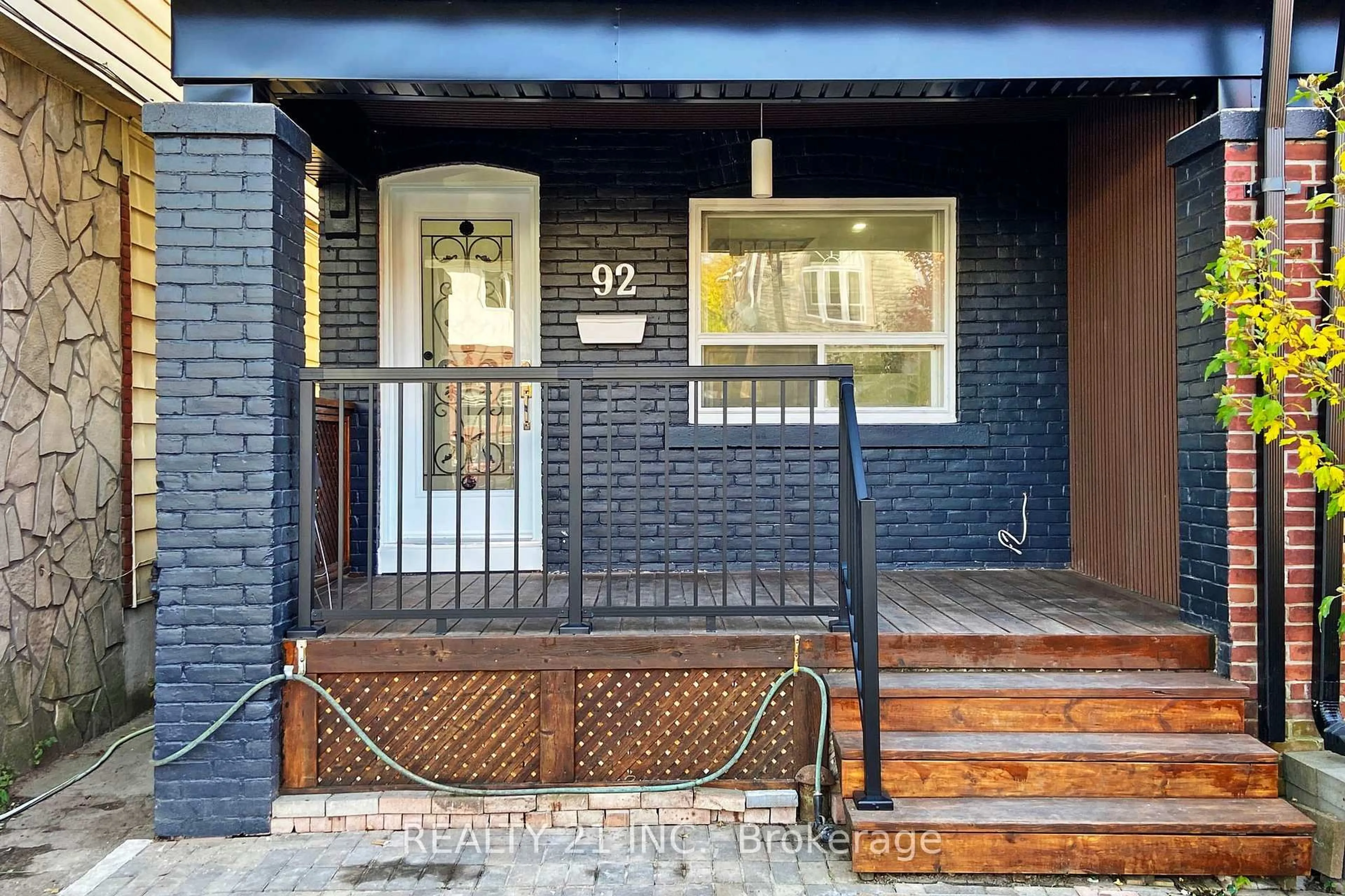 Home with brick exterior material, street for 92 King Edward Ave Ave, Toronto Ontario M4C 5J6