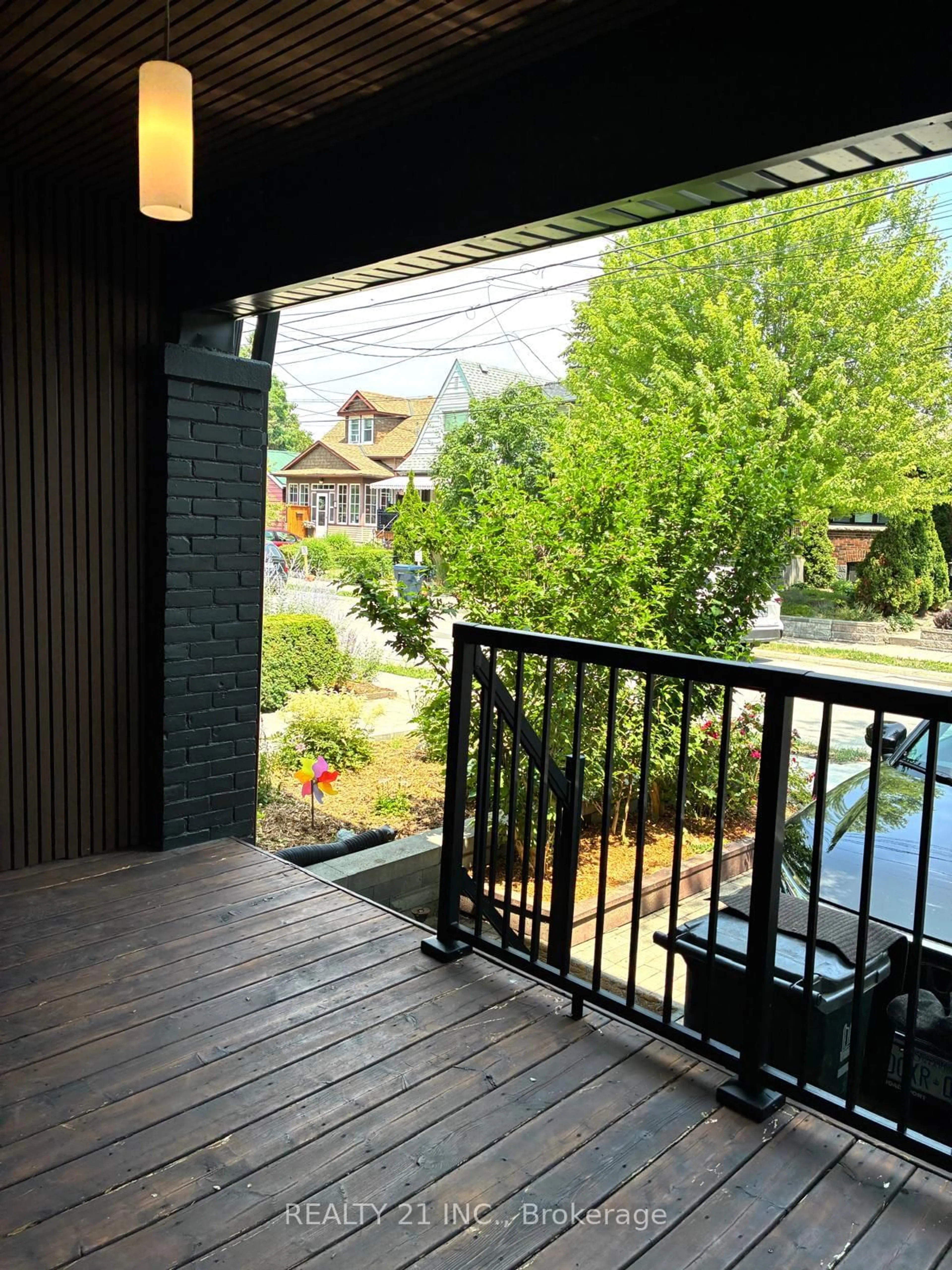 Patio, city buildings view from balcony for 92 King Edward Ave Ave, Toronto Ontario M4C 5J6