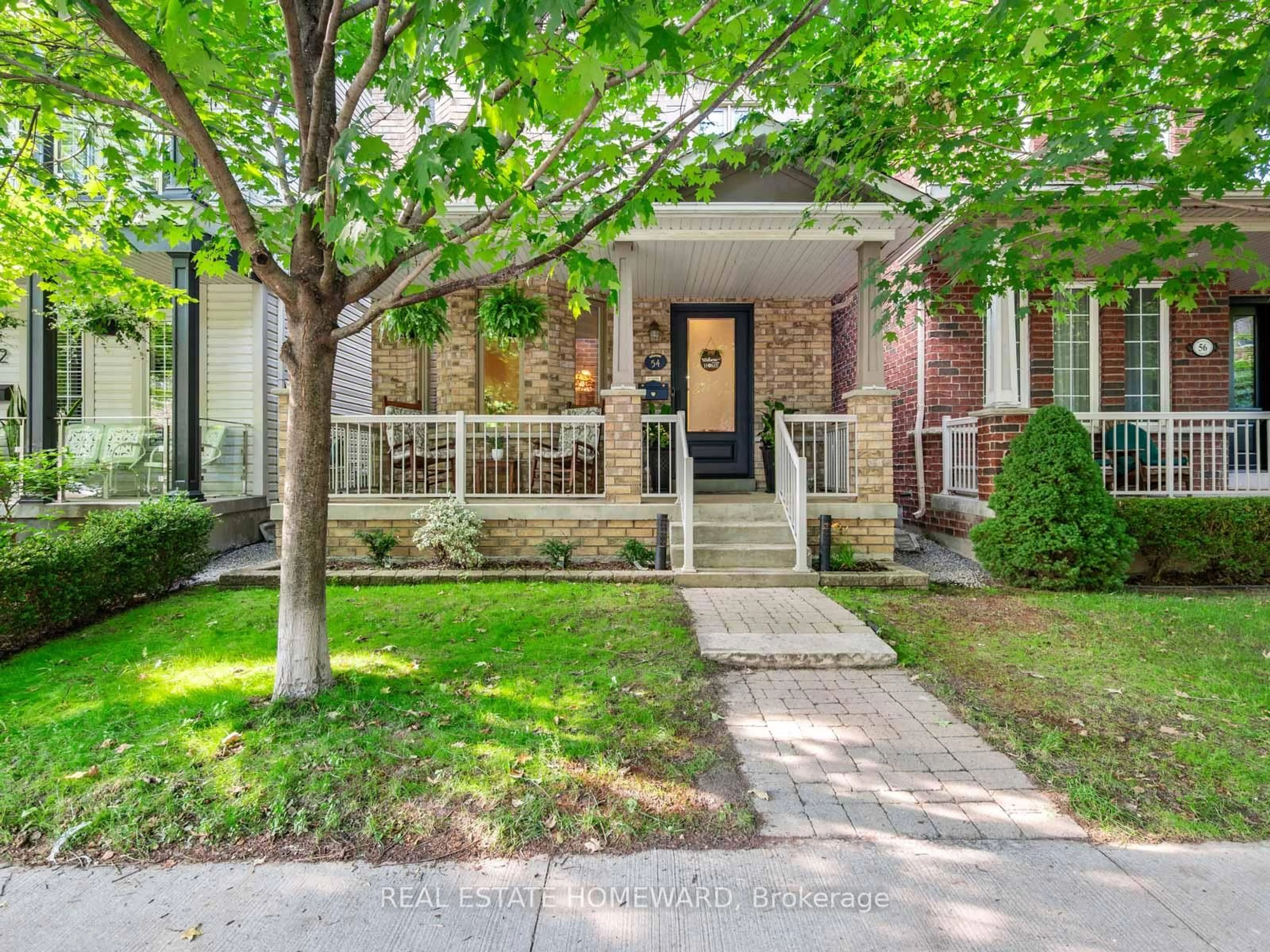 Home with brick exterior material, street for 54 Crossovers St, Toronto Ontario M4E 3X4