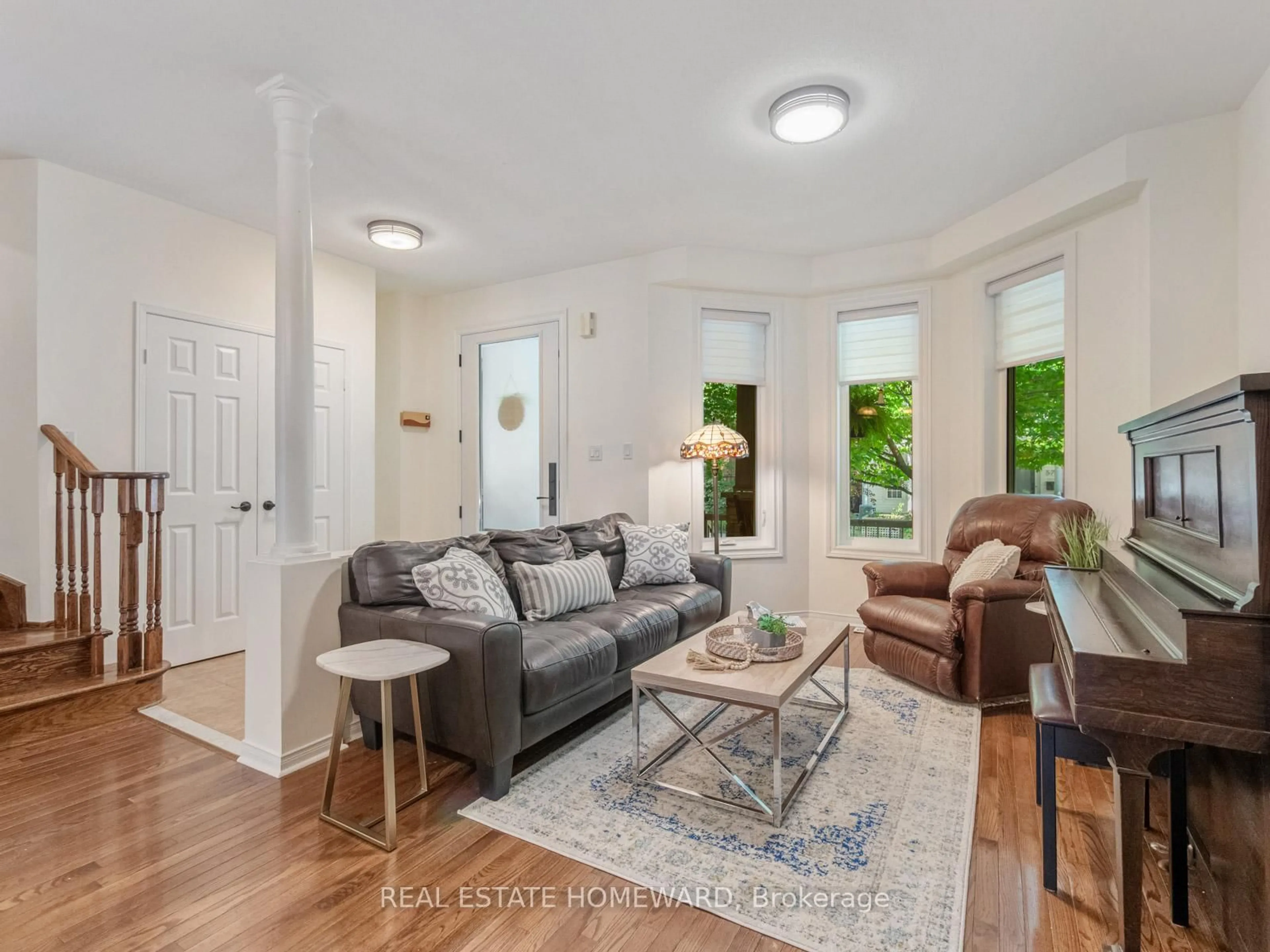 Living room with furniture, unknown for 54 Crossovers St, Toronto Ontario M4E 3X4