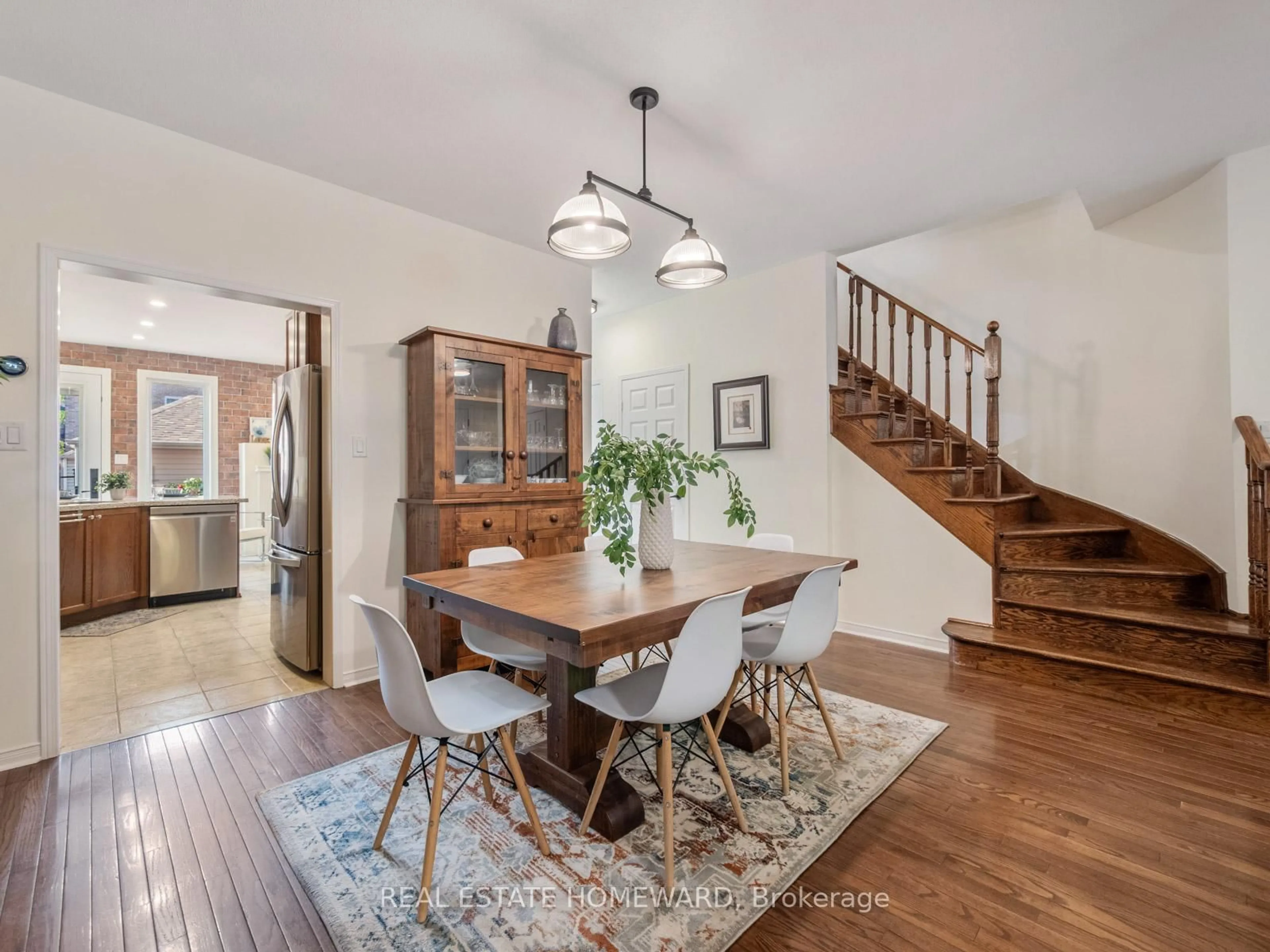 Dining room, wood/laminate floor for 54 Crossovers St, Toronto Ontario M4E 3X4