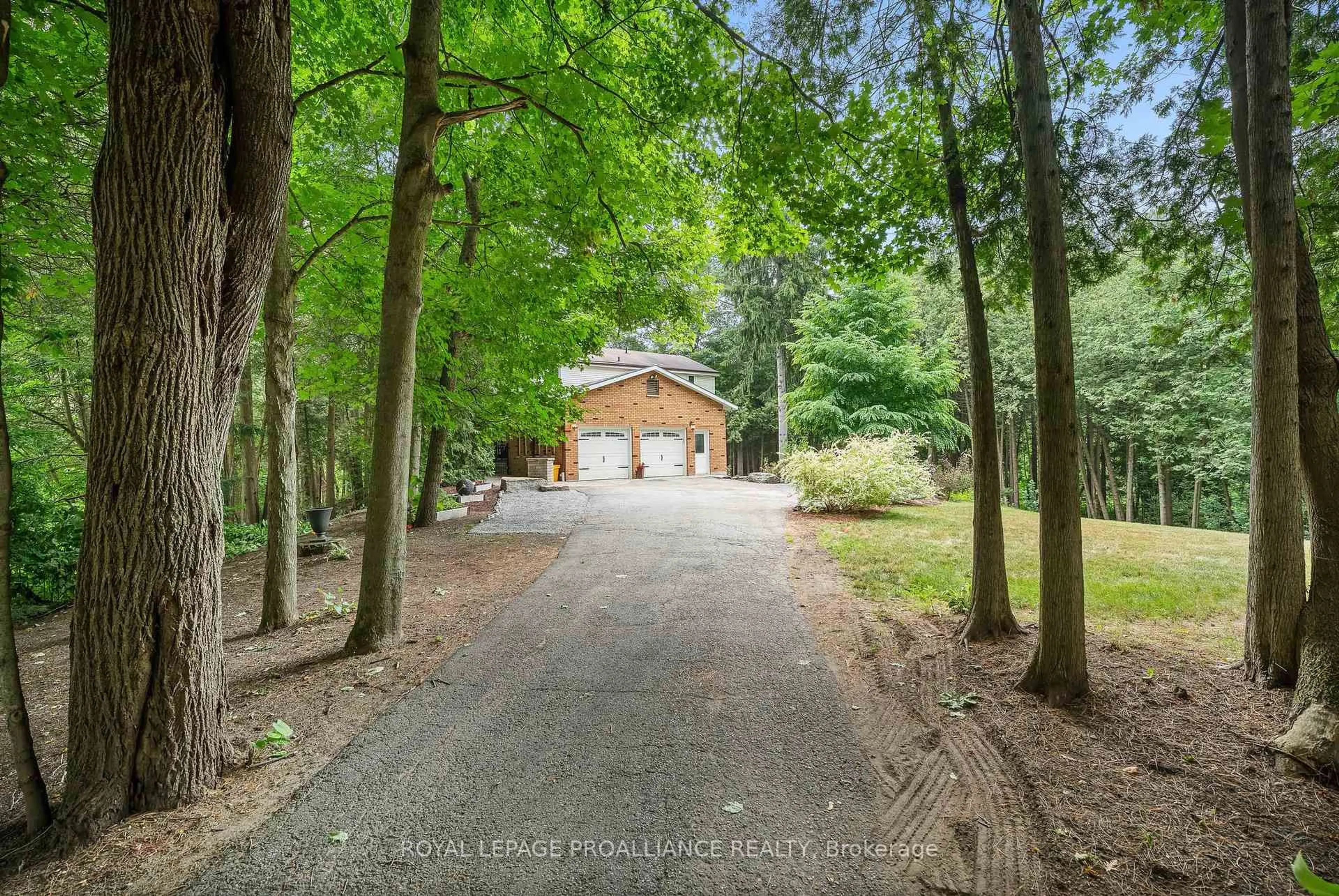 A pic from outside/outdoor area/front of a property/back of a property/a pic from drone, forest/trees view for 11 Pamela Crt, Clarington Ontario L1C 4N6