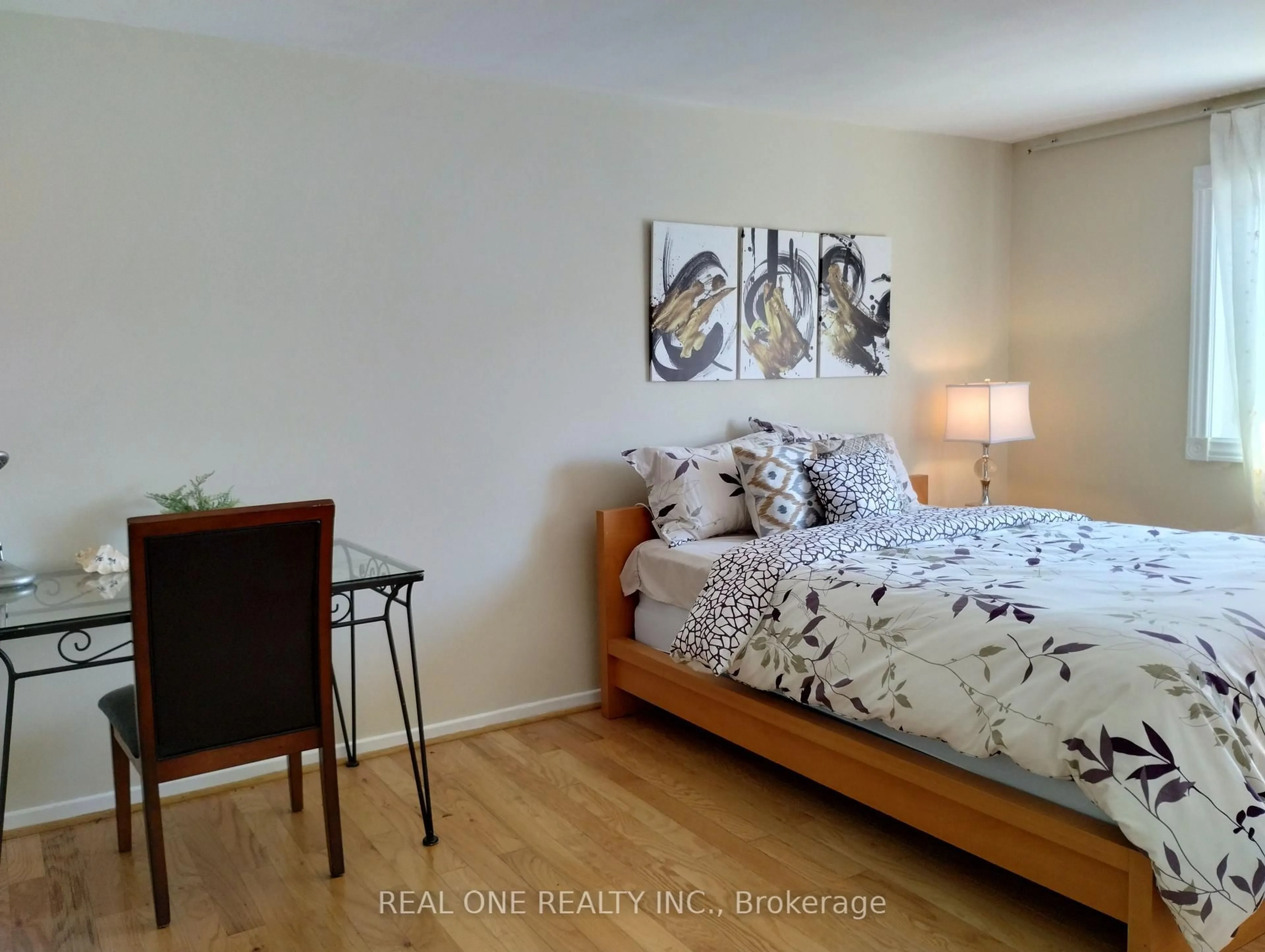 Bedroom with bed, wood/laminate floor for 7 McCool Crt, Toronto Ontario M1V 2E3