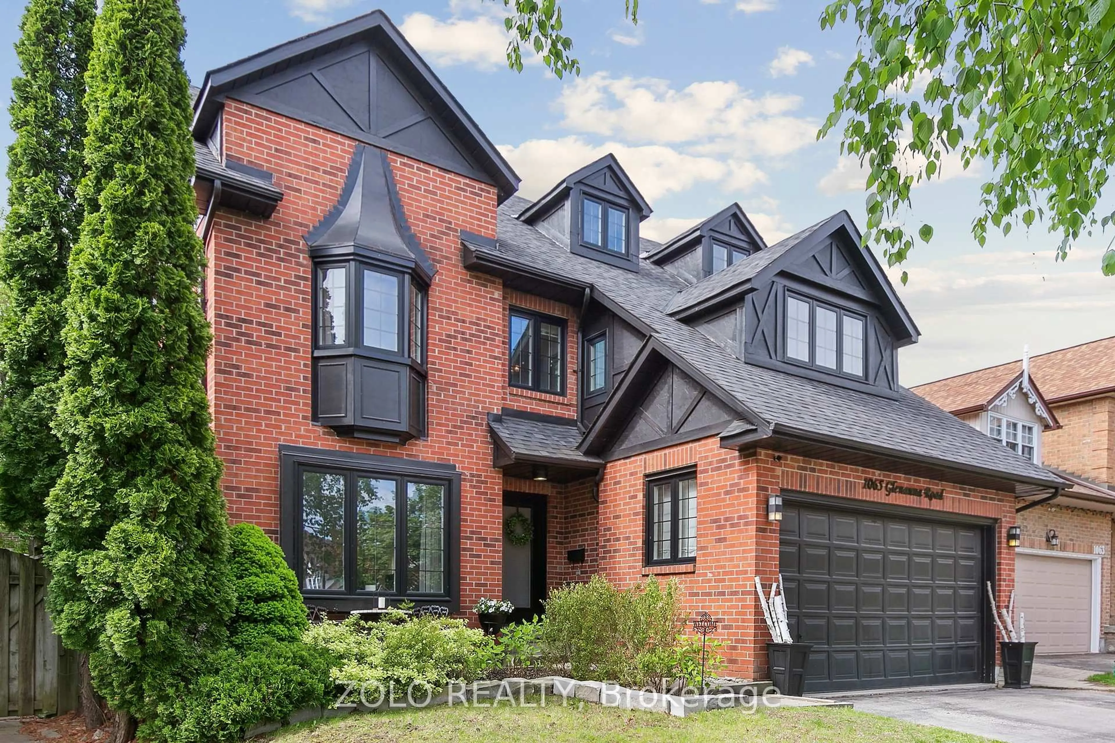 Home with brick exterior material, street for 1065 Glenanna Rd, Pickering Ontario L1V 5E1