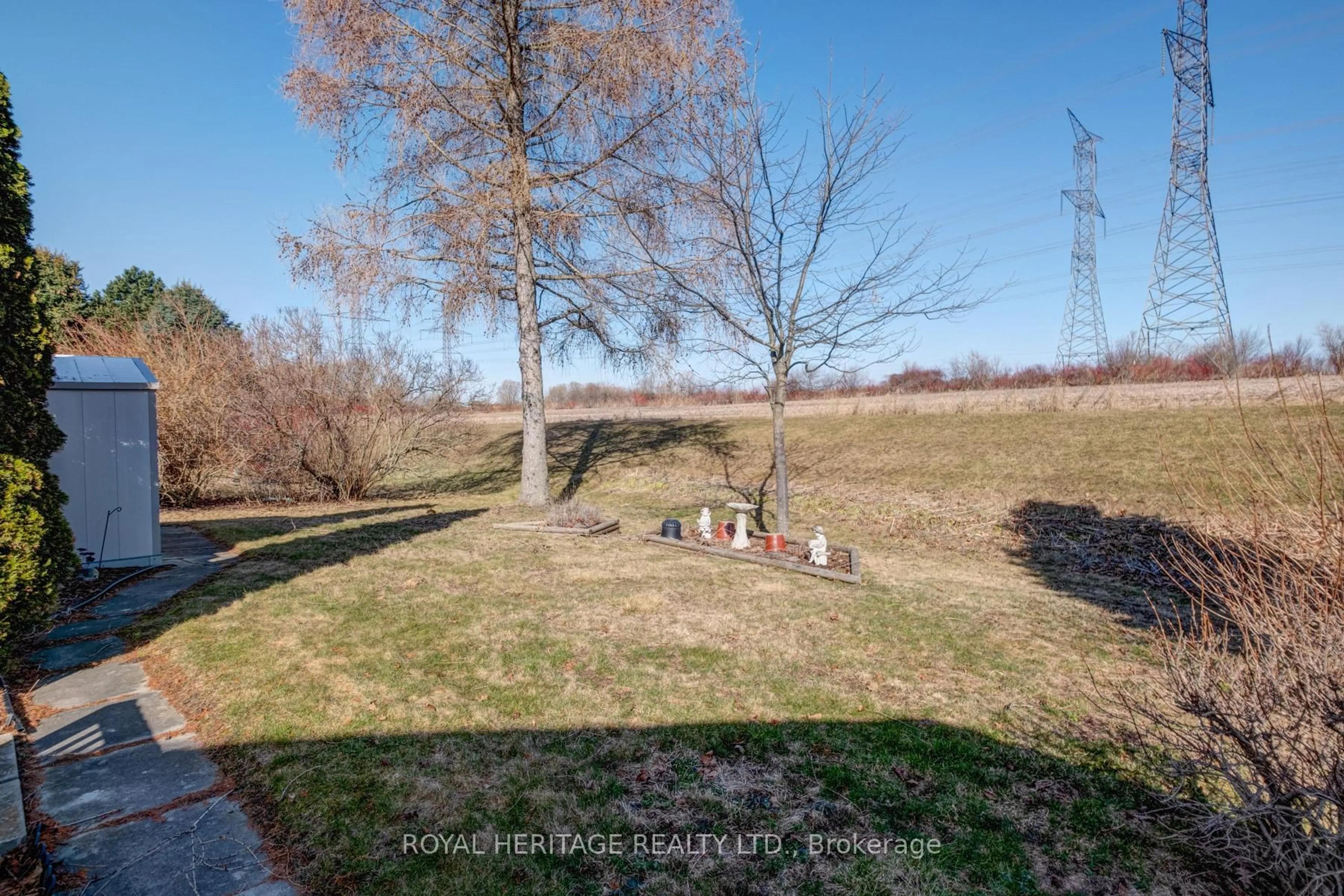 A pic from outside/outdoor area/front of a property/back of a property/a pic from drone, forest/trees view for 46 Wilmot Tr, Clarington Ontario L1B 1B8