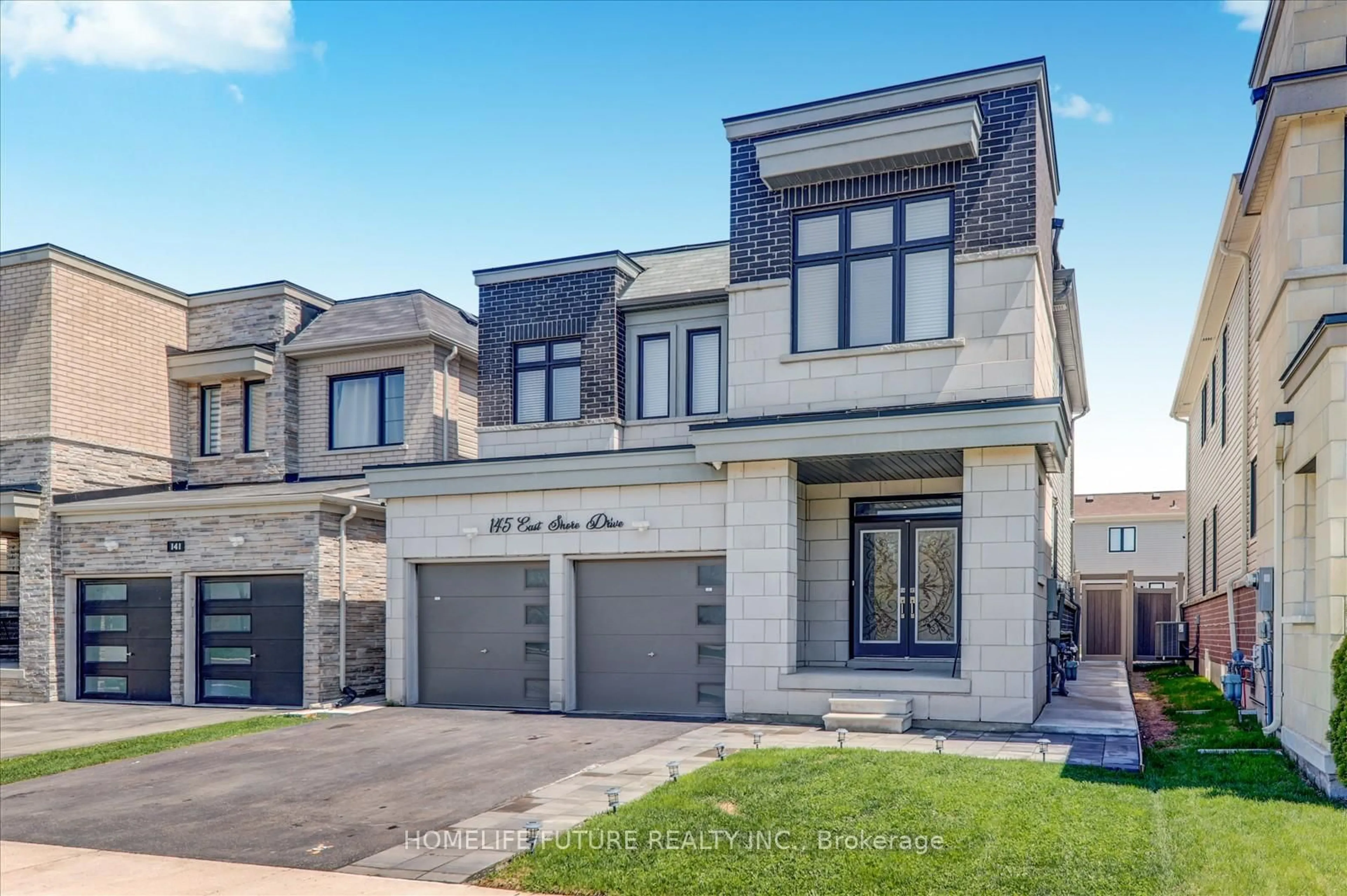 Home with brick exterior material, street for 145 East Shore Dr, Clarington Ontario L1C 1Z8