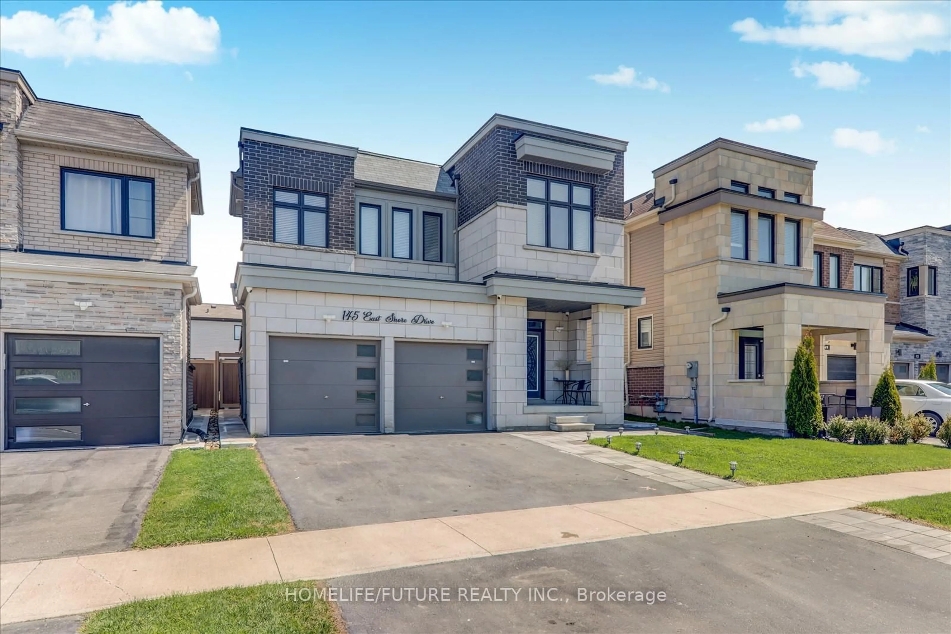 Home with brick exterior material, street for 145 East Shore Dr, Clarington Ontario L1C 1Z8