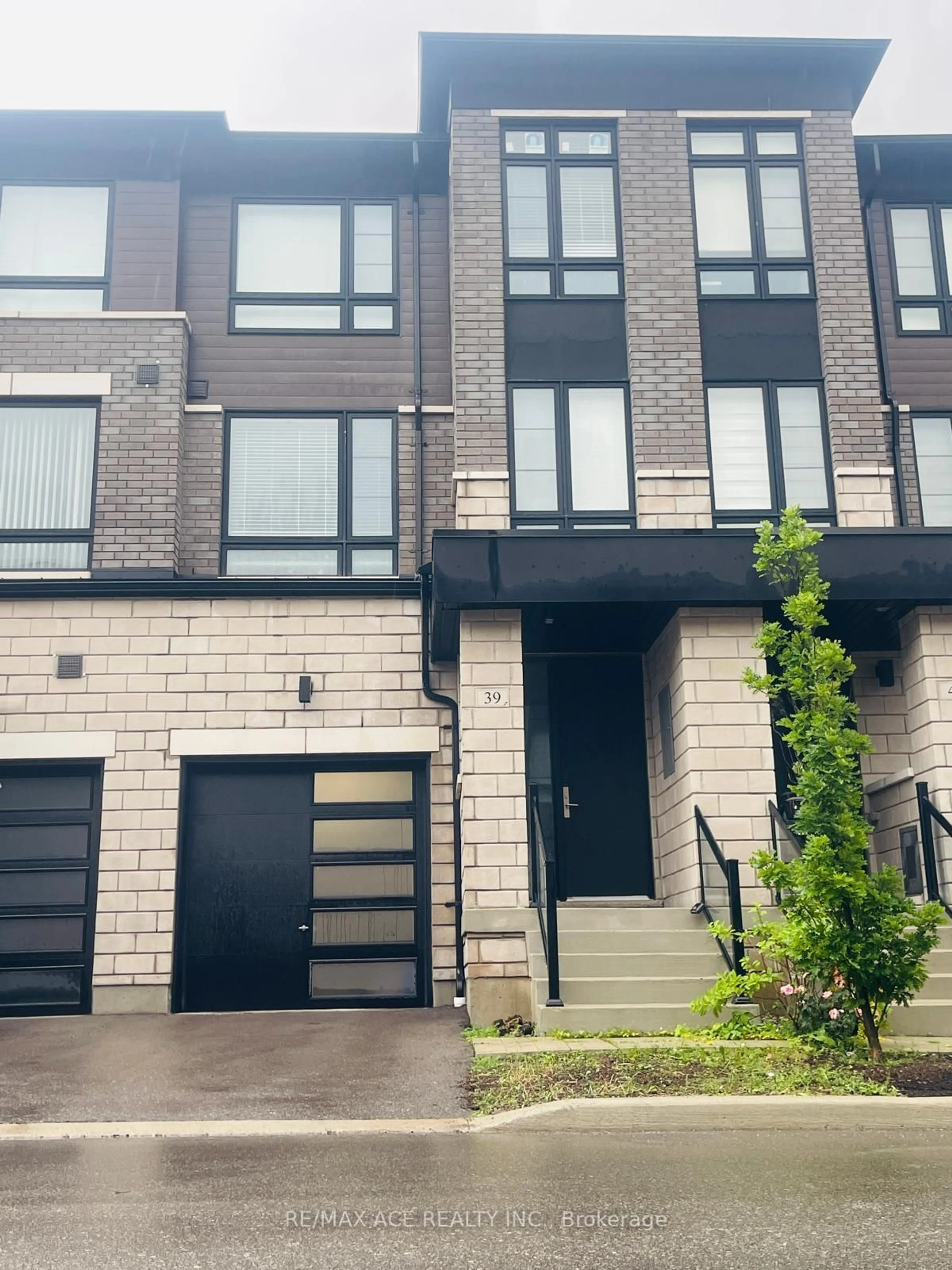 Home with brick exterior material, street for 39 Lake Trail Way, Whitby Ontario L1M 0M3